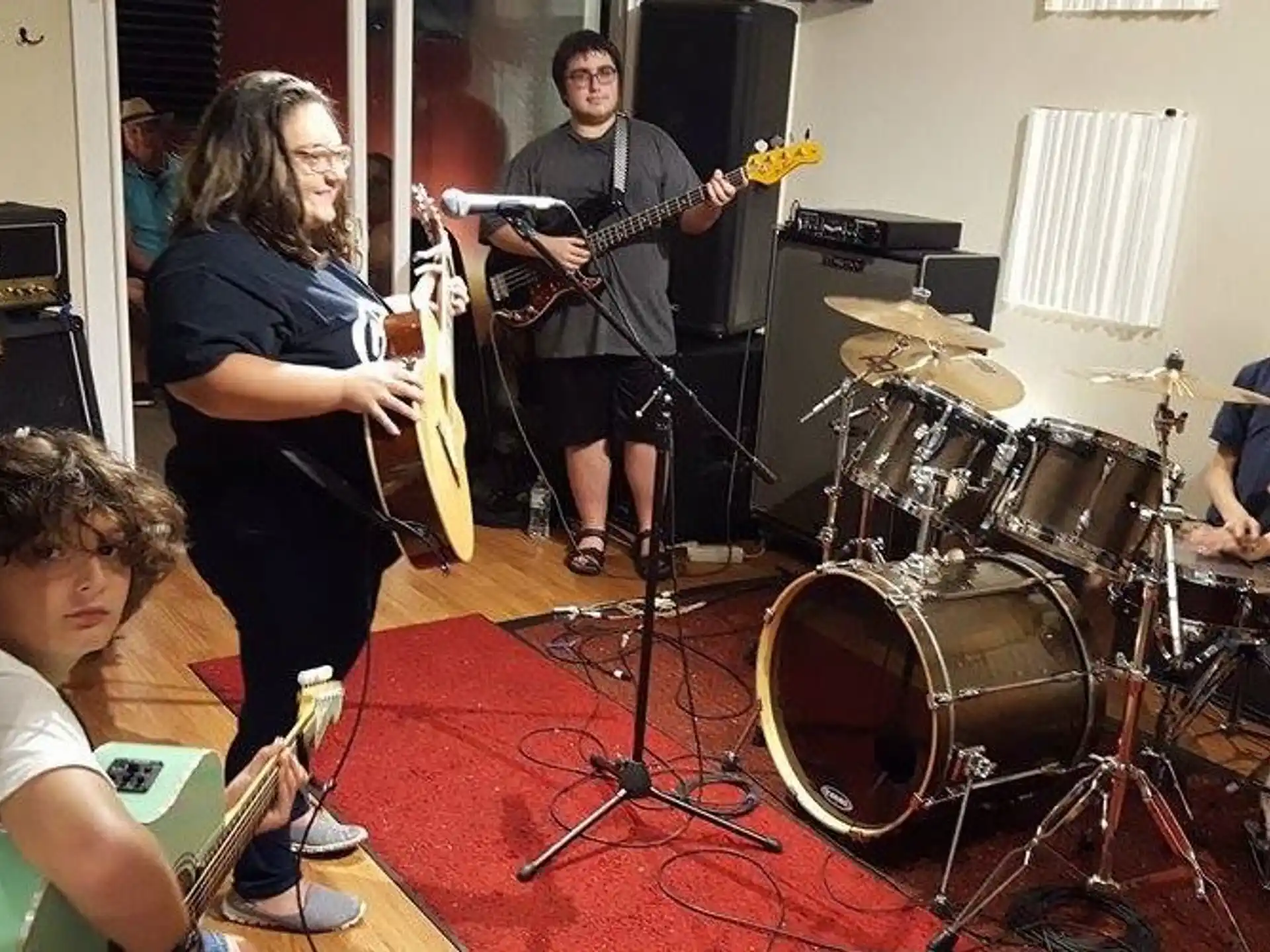a group of people playing instruments