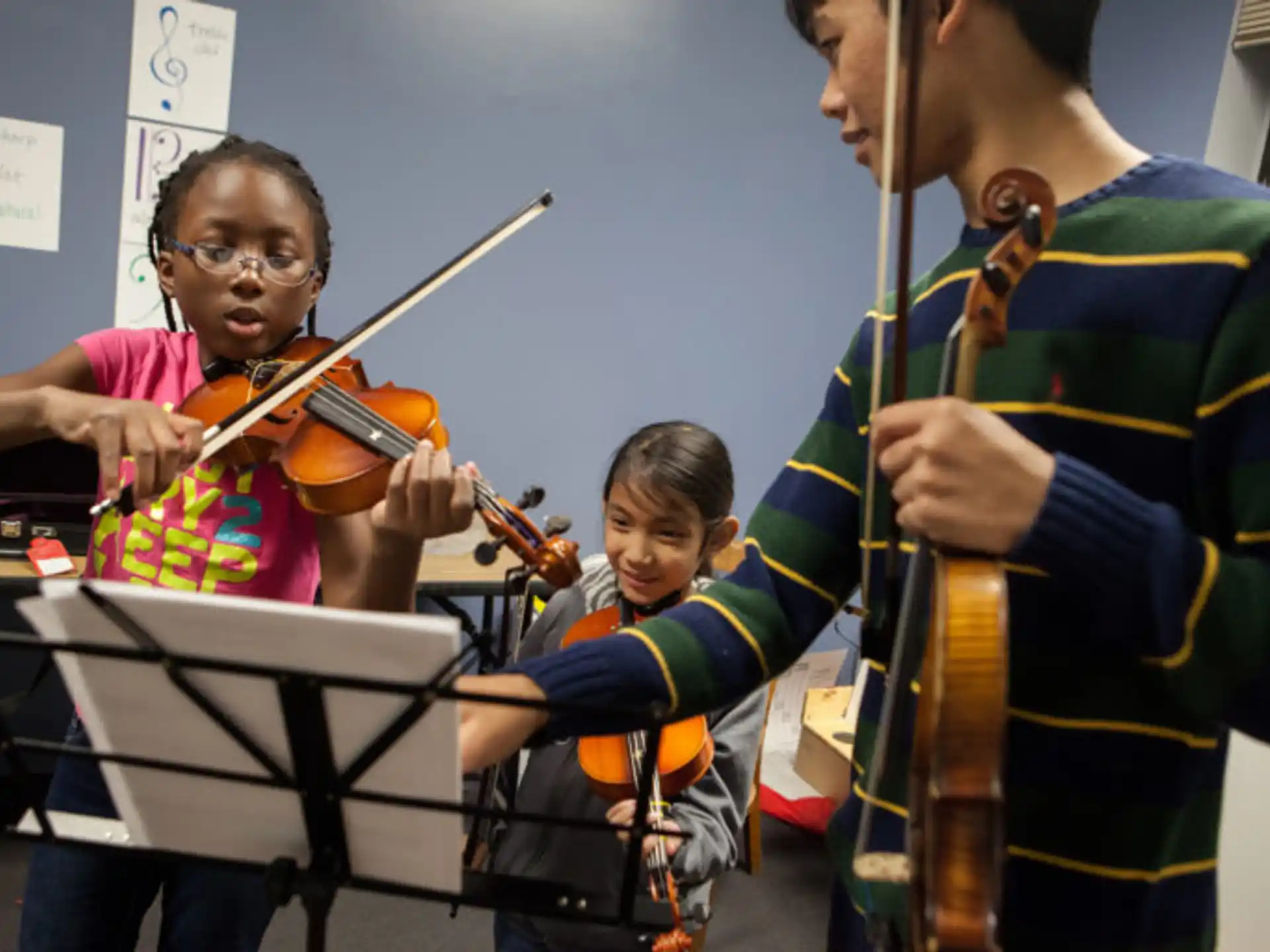 a group of people playing musical instruments
