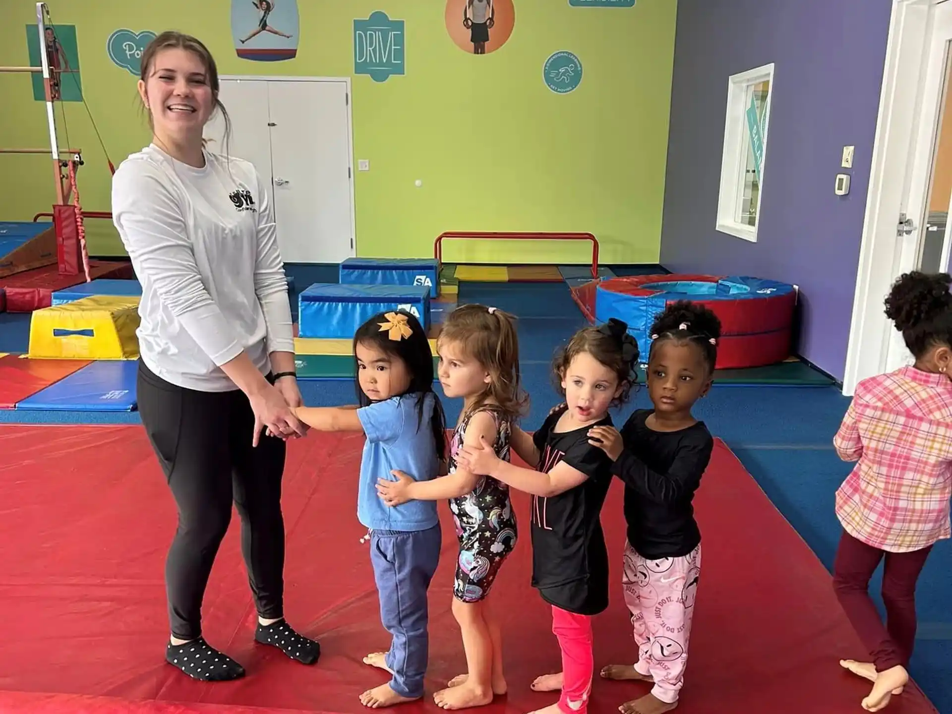 a person and several children in a room