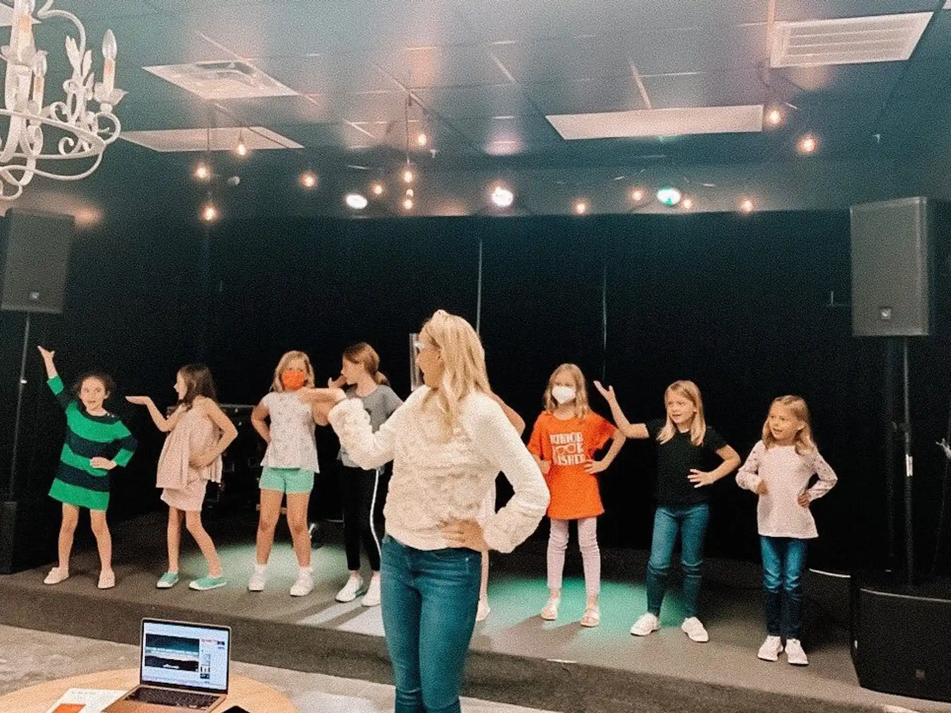 a group of children on a stage