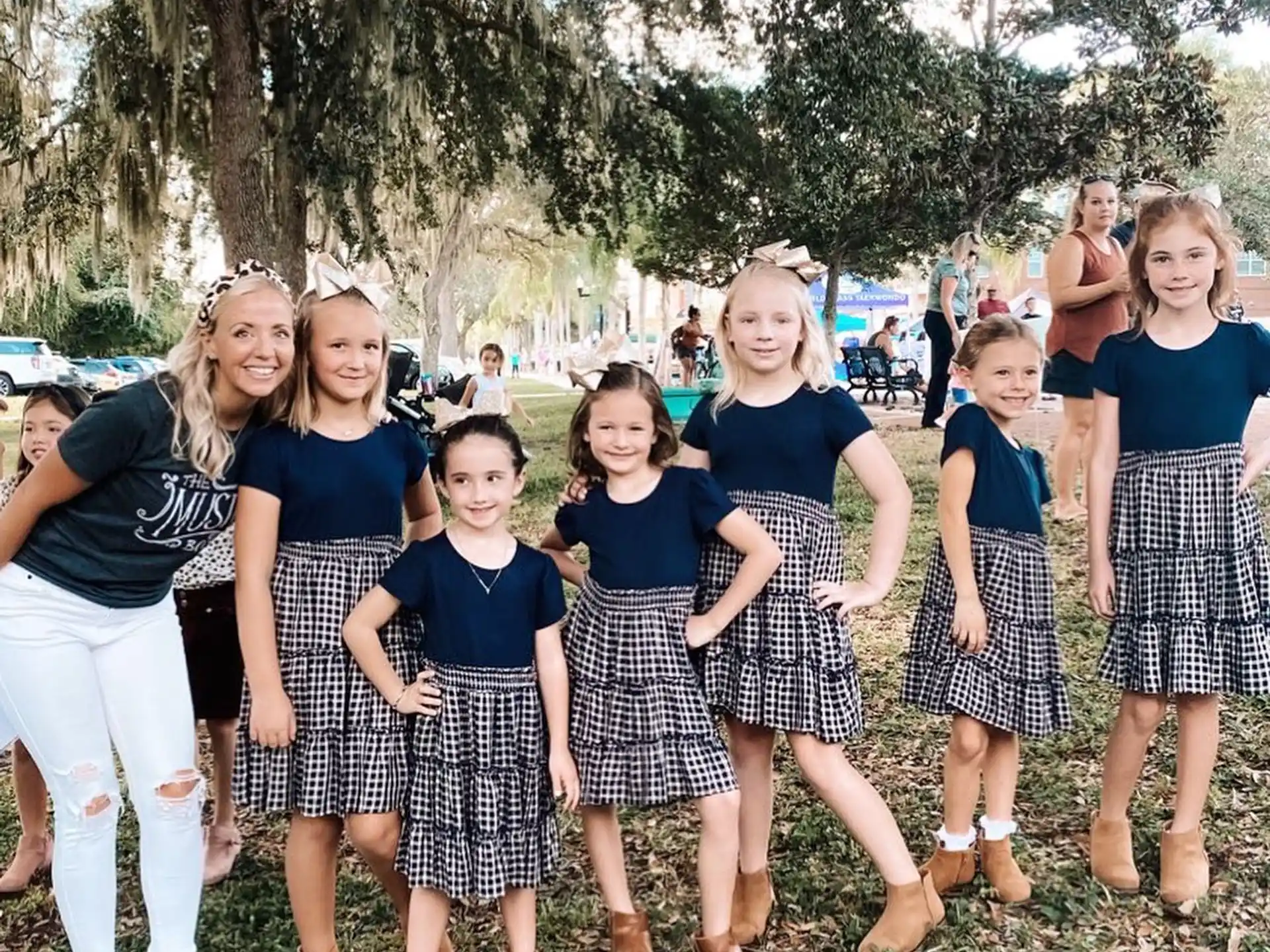 a group of girls posing for a photo