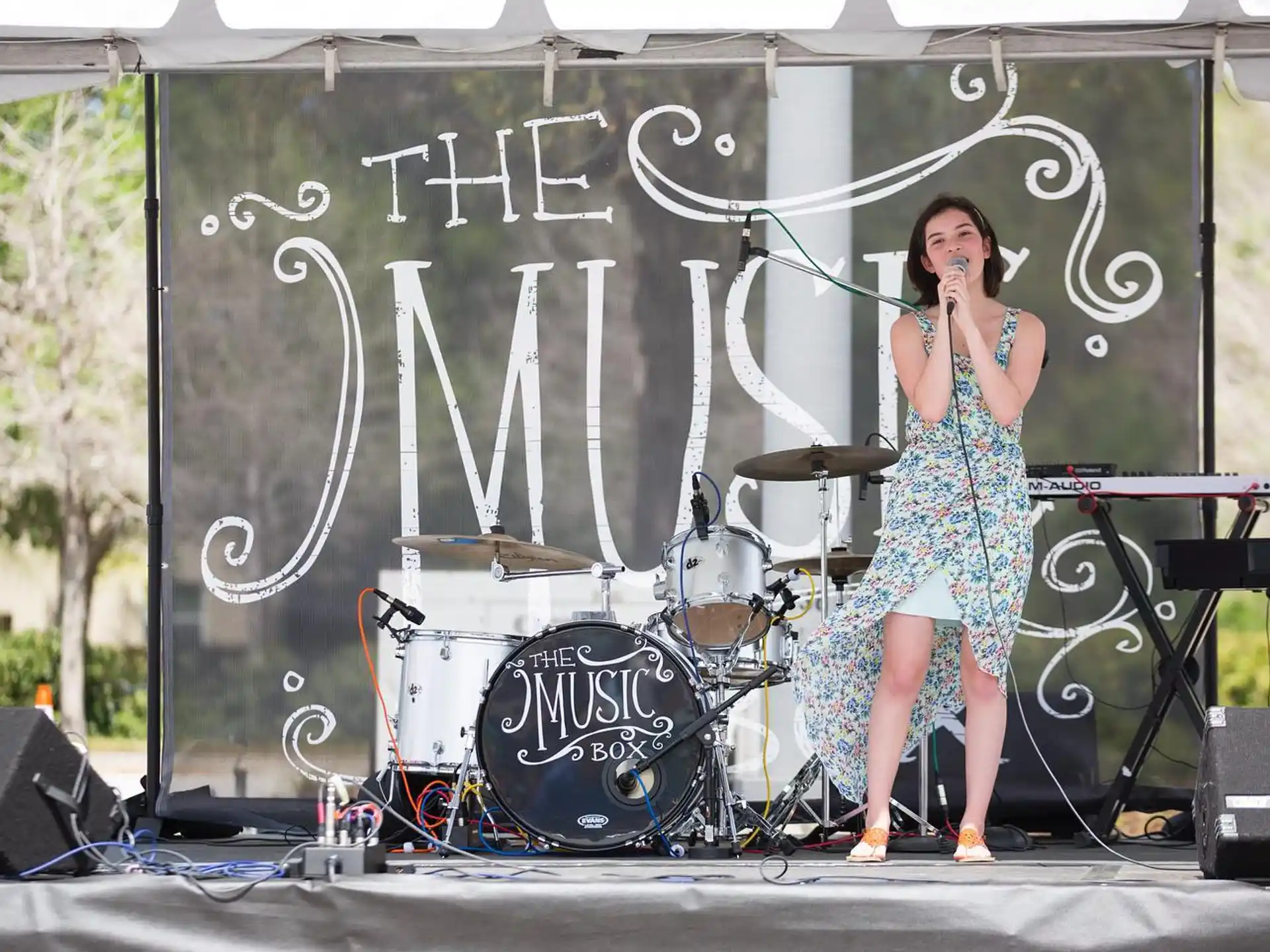 a person singing on a stage
