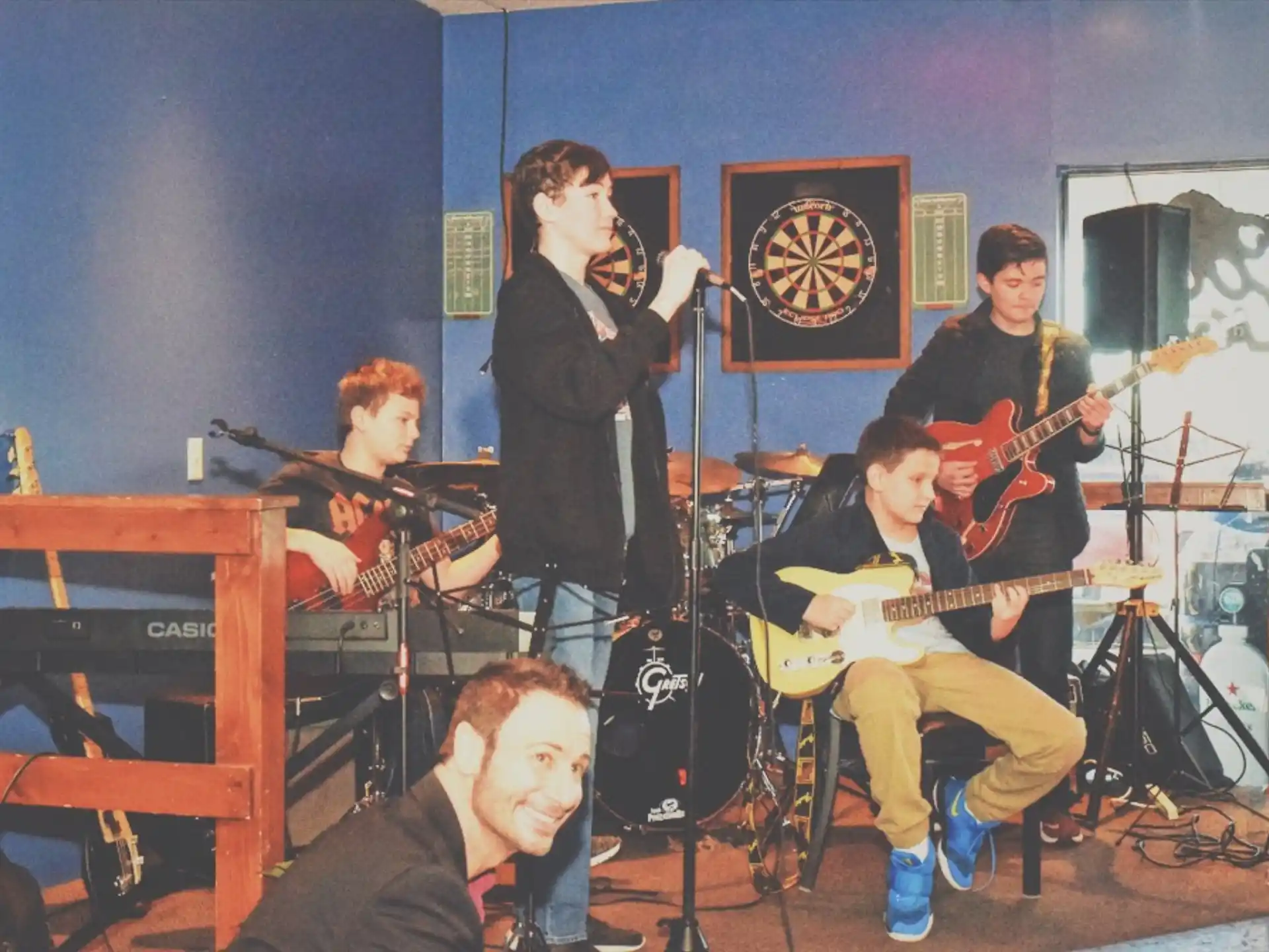 a group of people playing instruments
