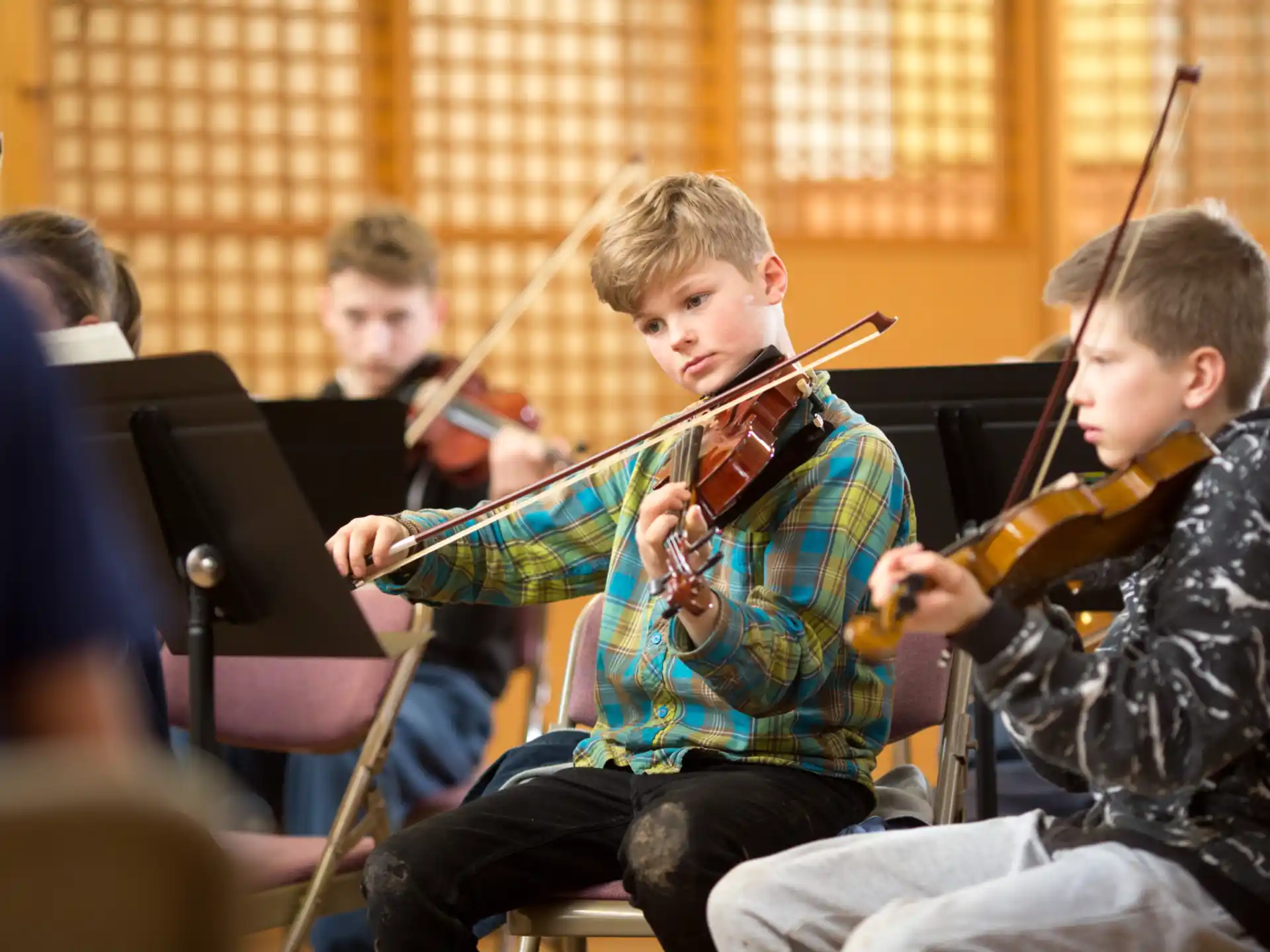 a group of people playing musical instruments