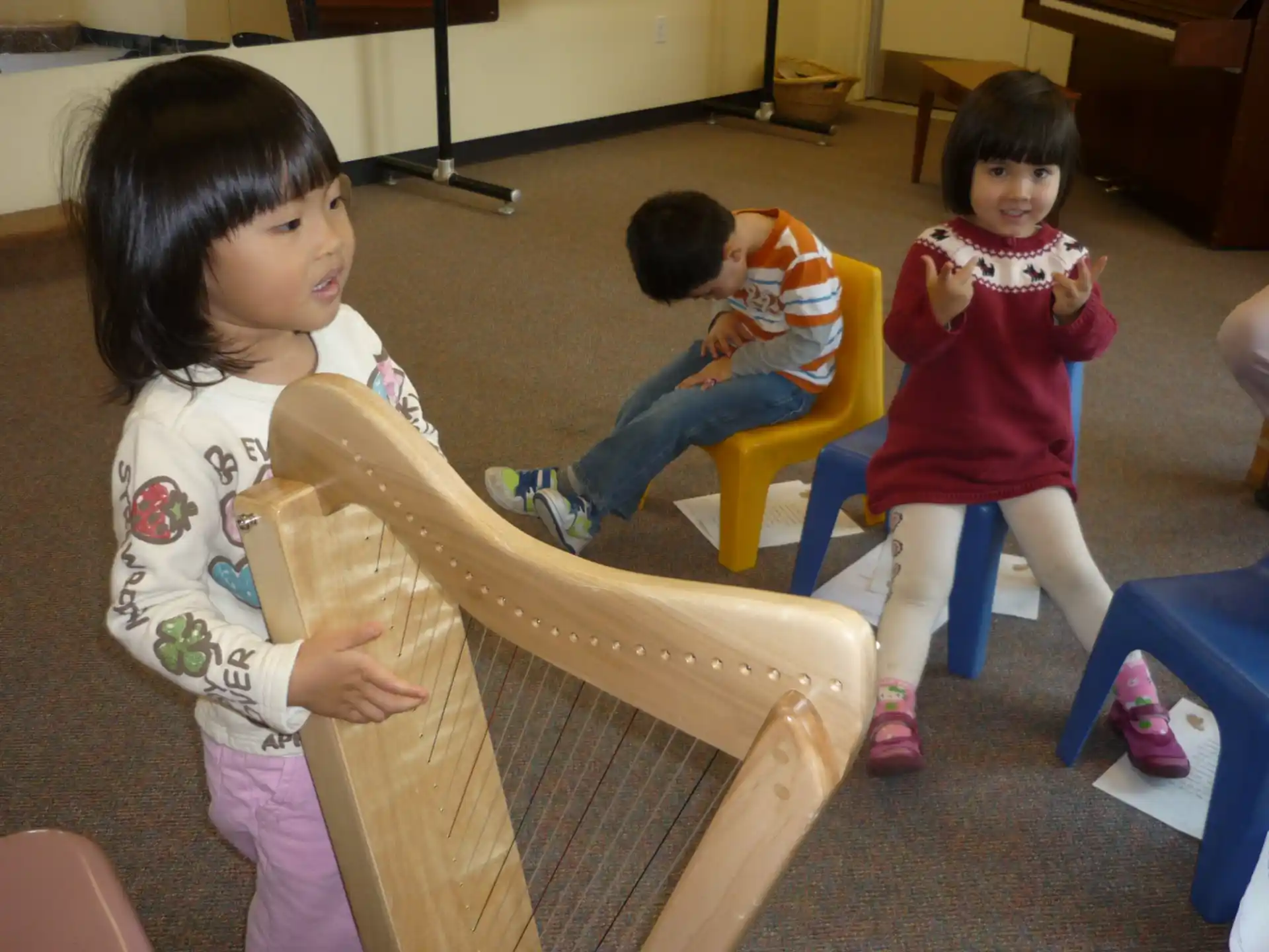 a group of children playing with a toy