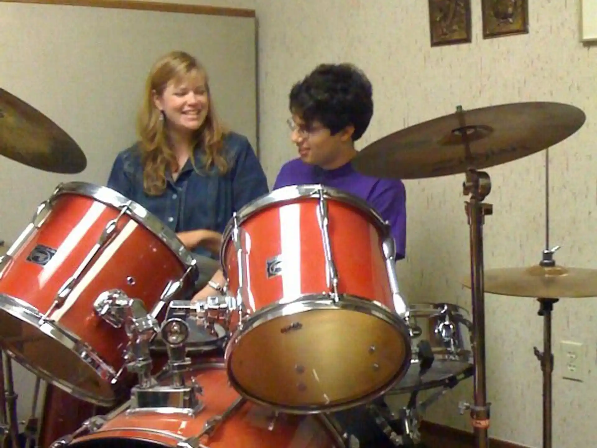 a group of people playing drums
