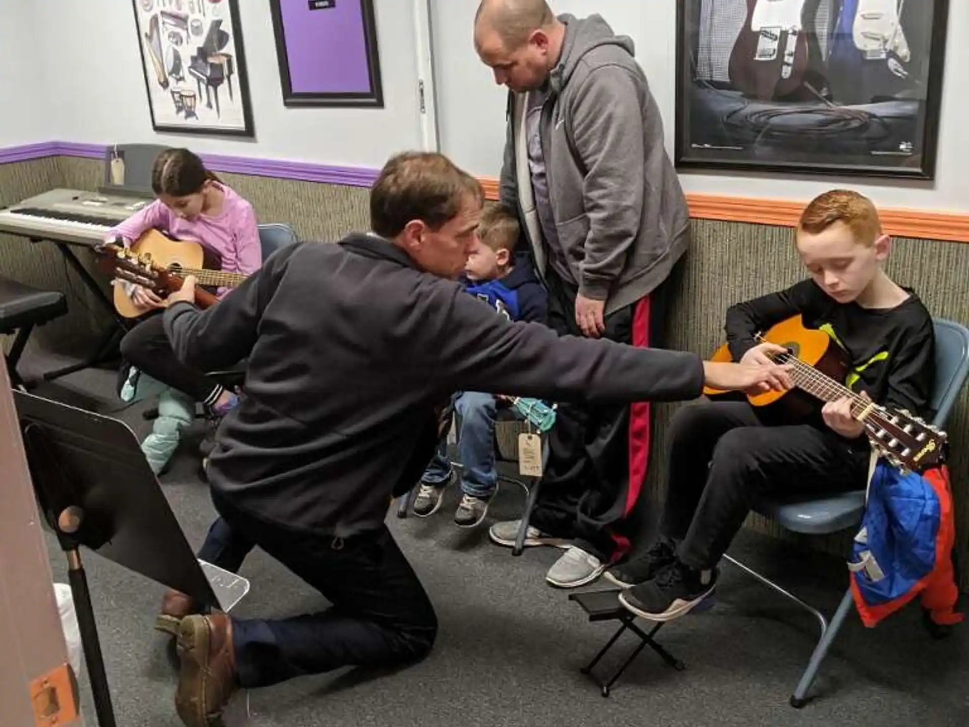 a group of people playing instruments