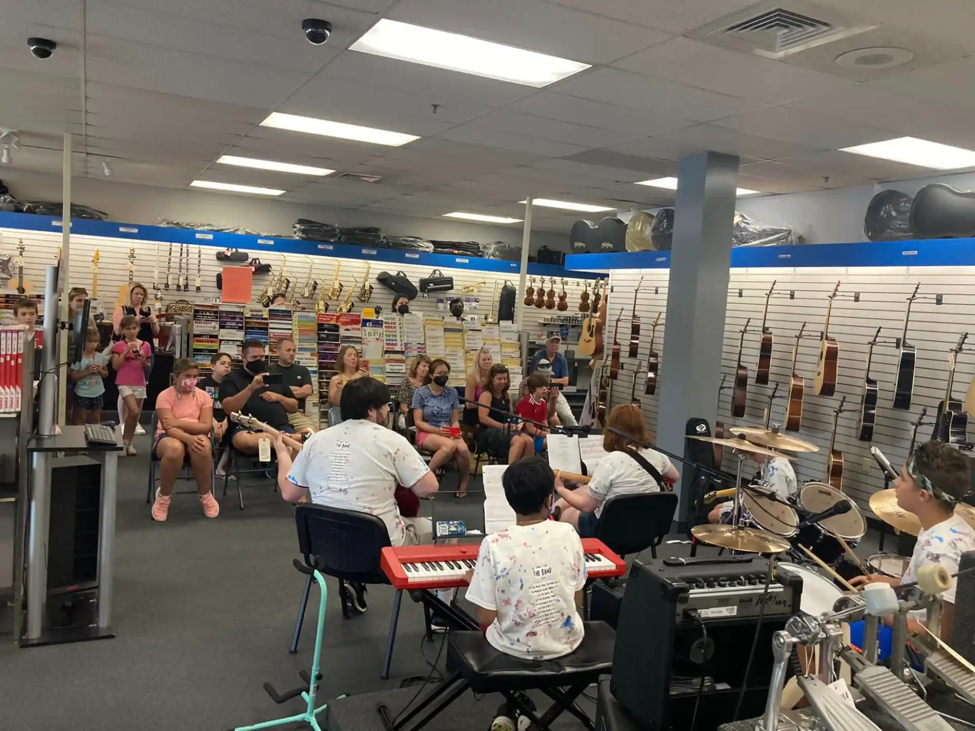 a group of people sitting in a room