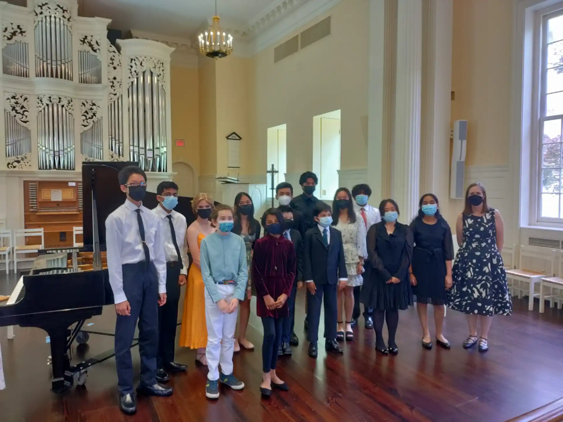 a group of people standing in a room