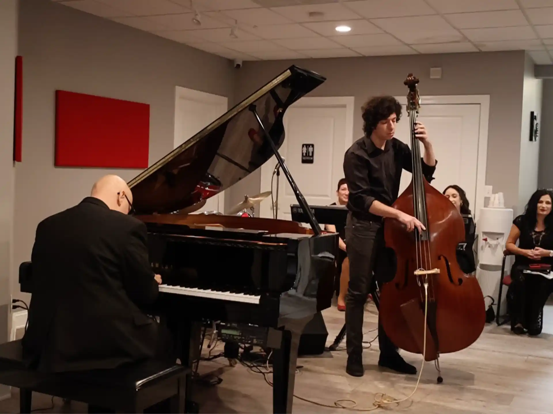 a group of people playing instruments