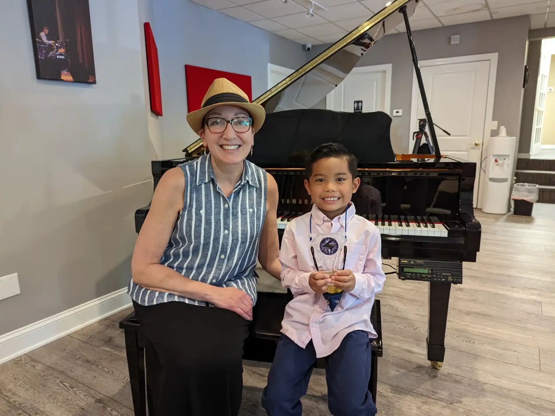 a person and a boy posing for a picture