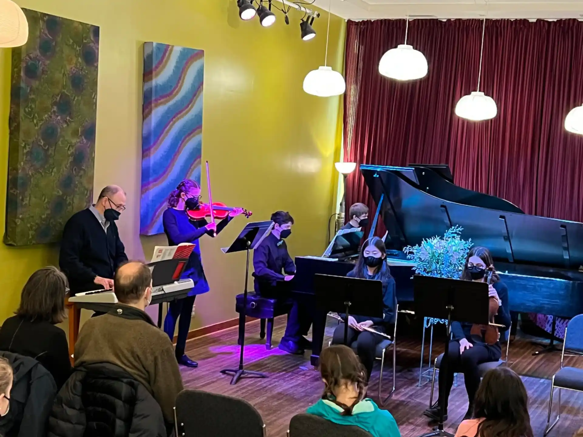 a group of people playing instruments