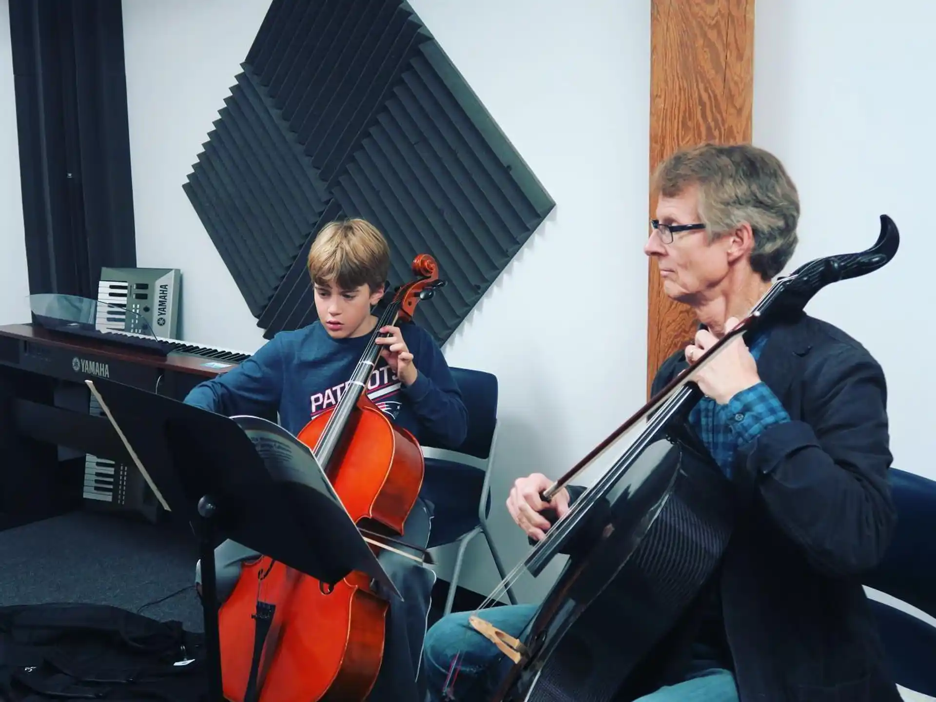 a couple of men playing musical instruments
