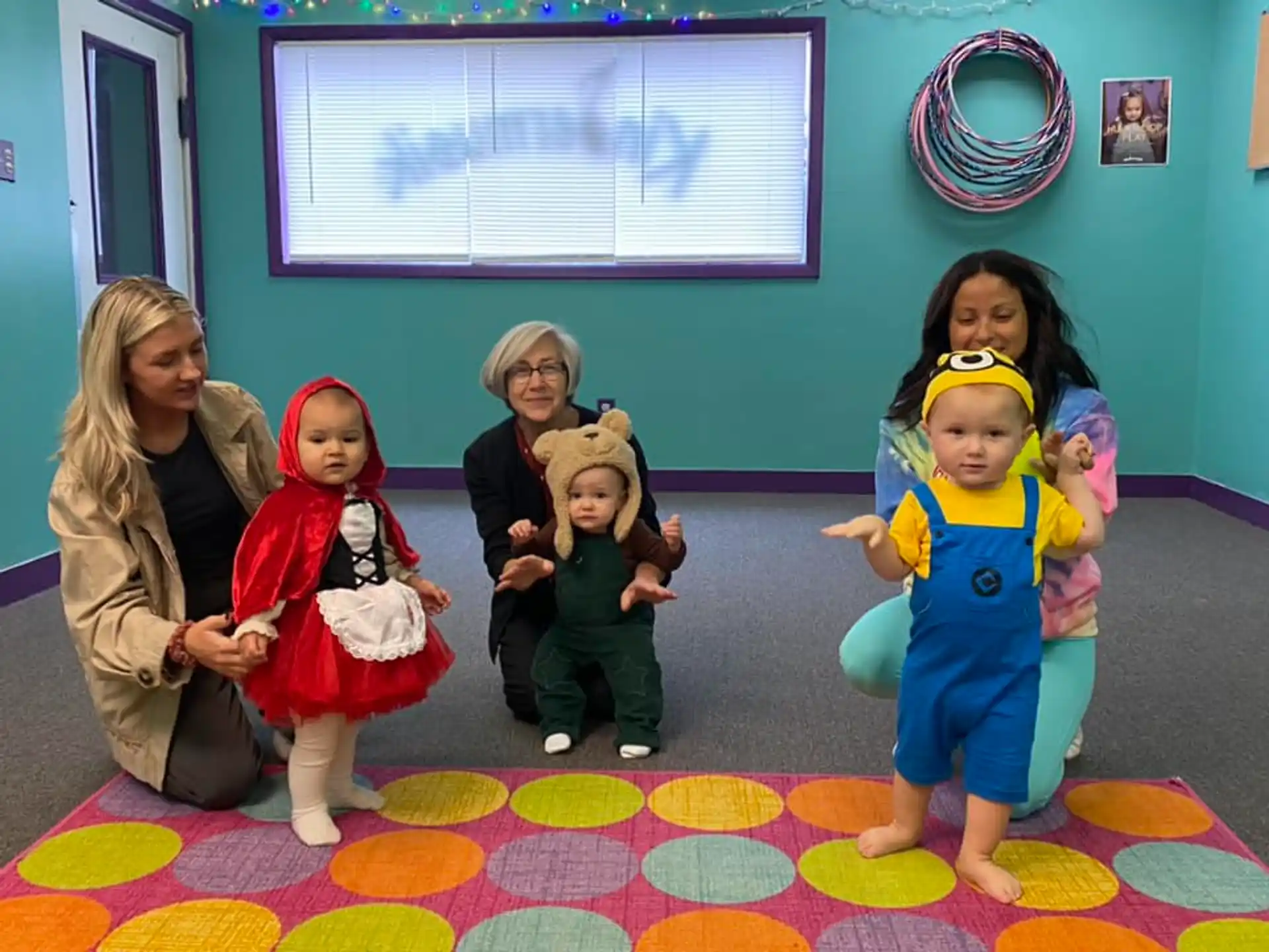 a group of children sitting on the floor