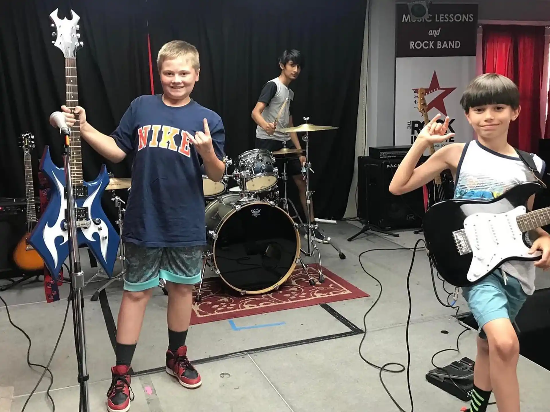 a group of boys playing instruments
