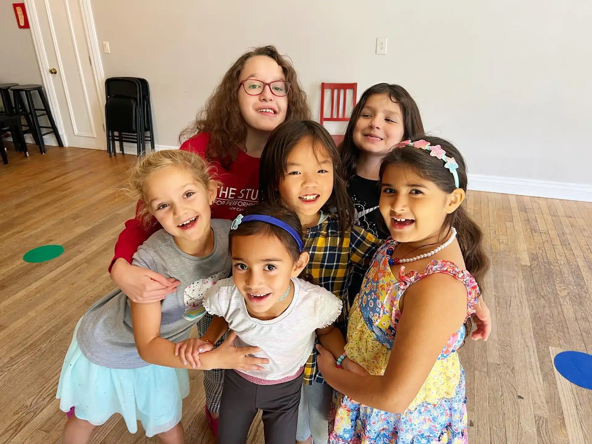 a group of children posing for a photo