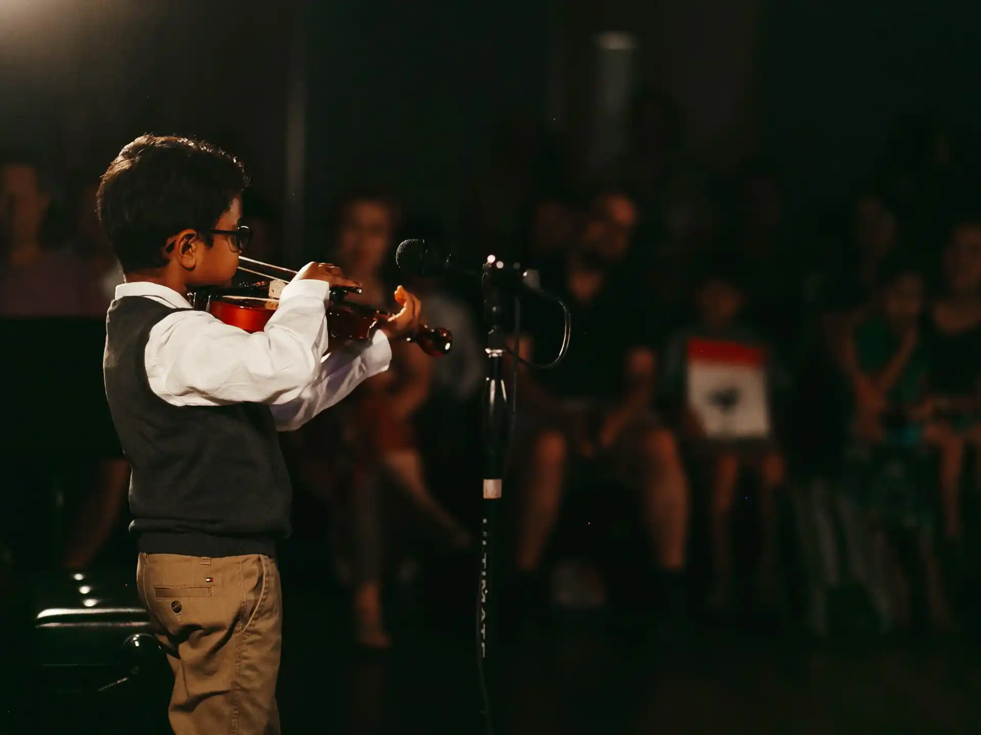 a man playing a violin