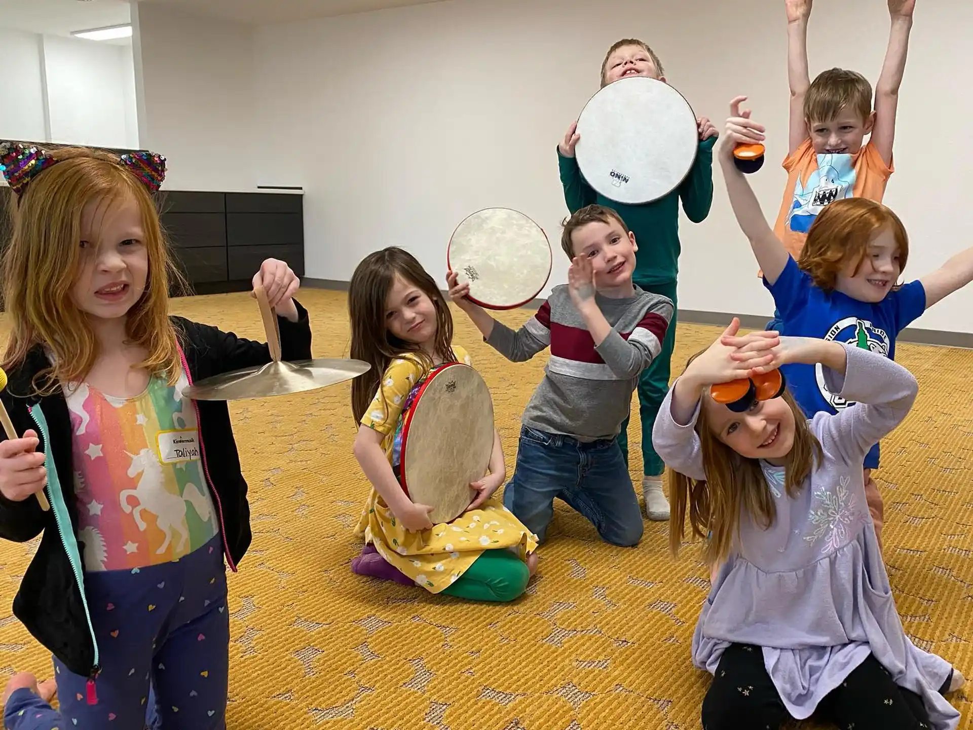 a group of children in clothing