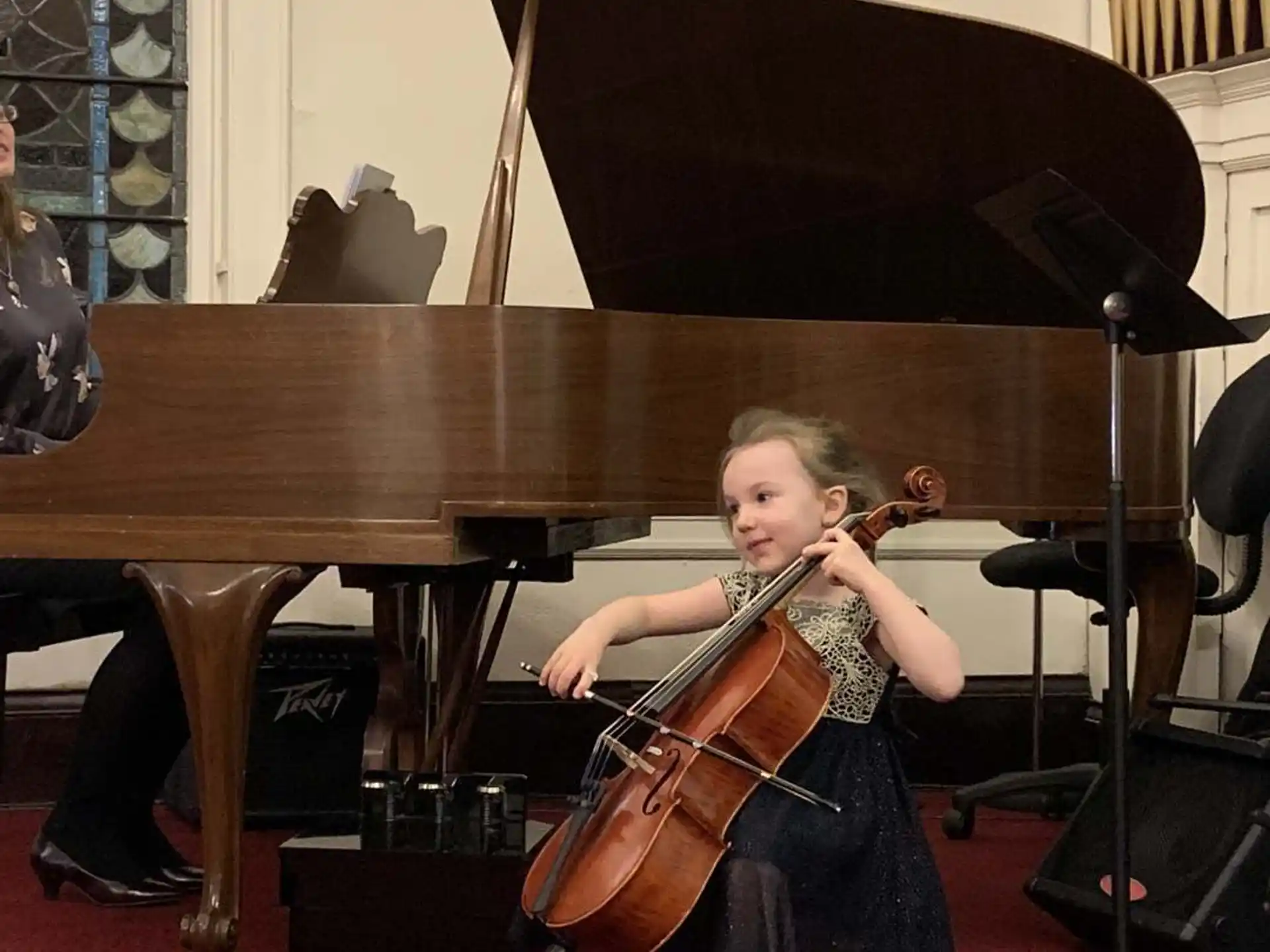 a girl playing a violin