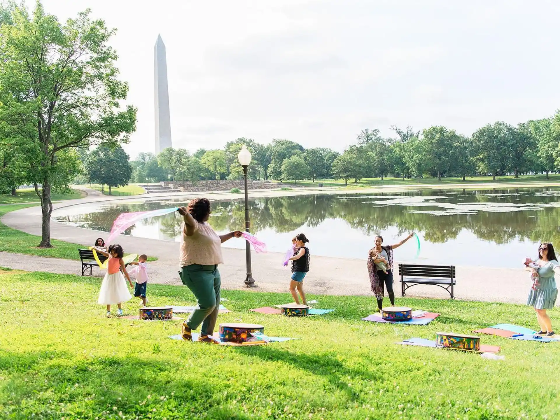 a group of people playing in a park