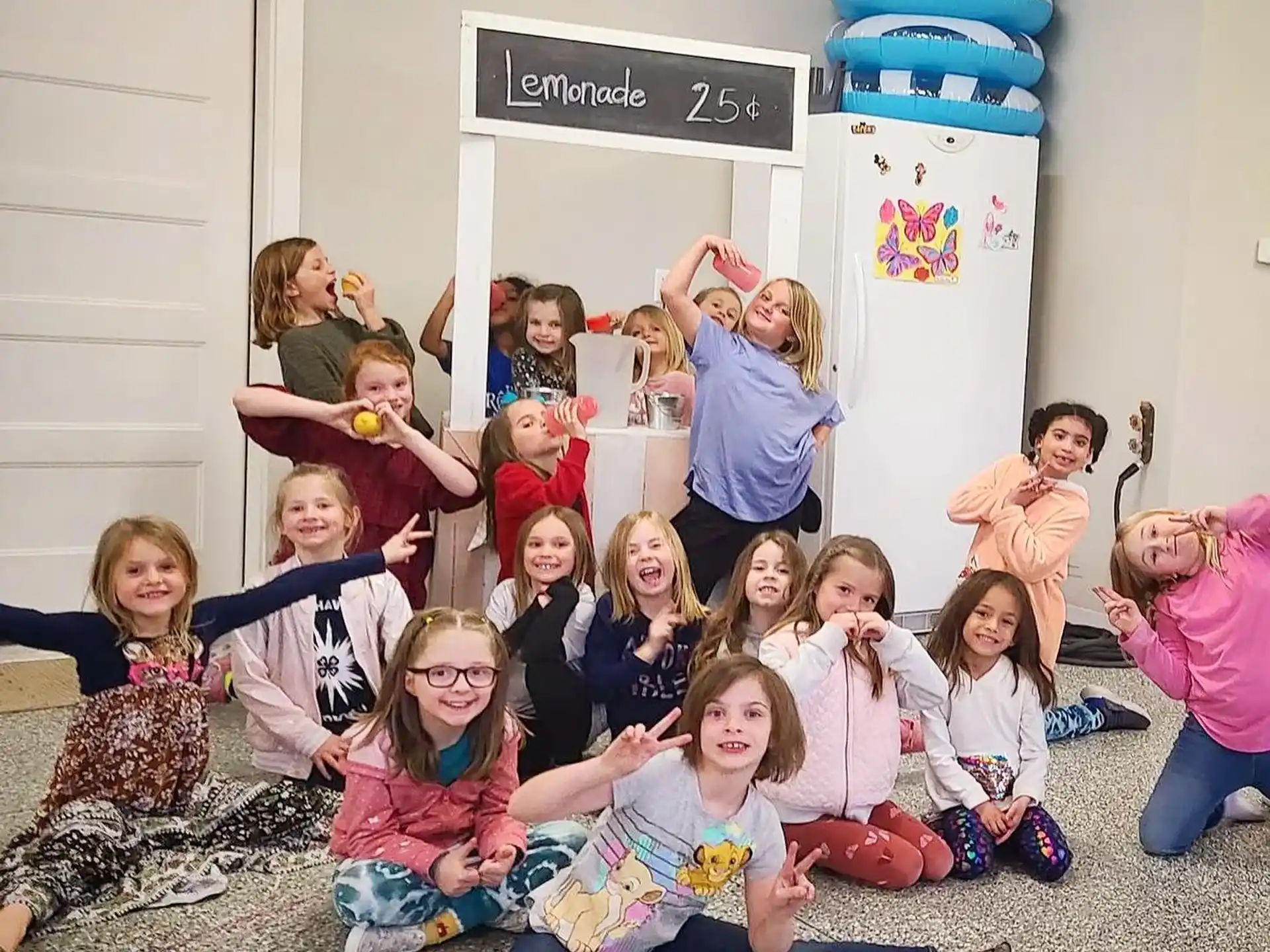 a group of children posing for a photo