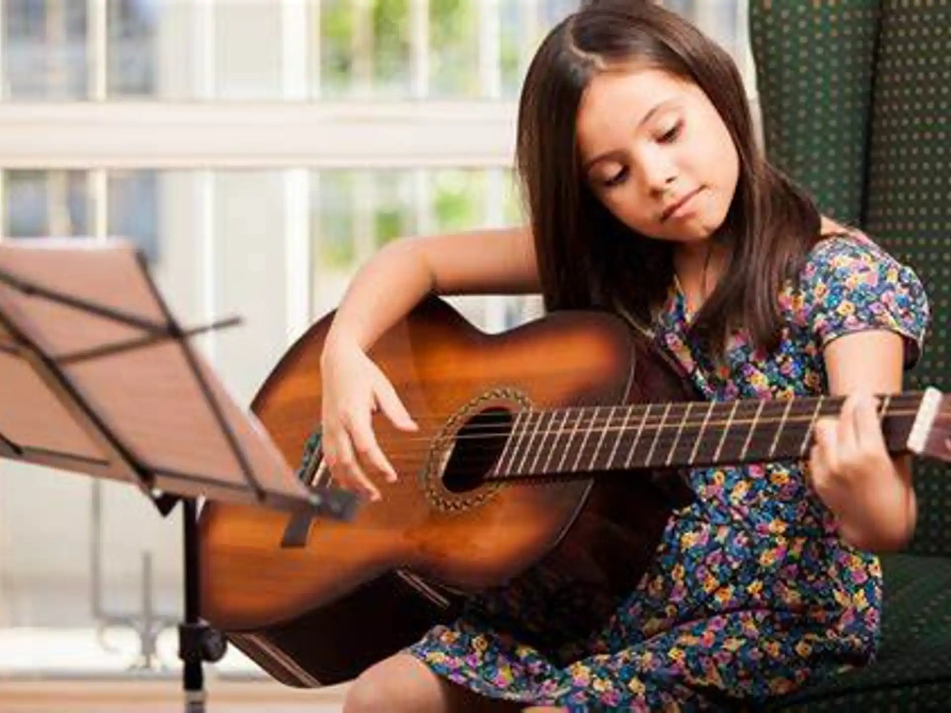 a person playing a guitar