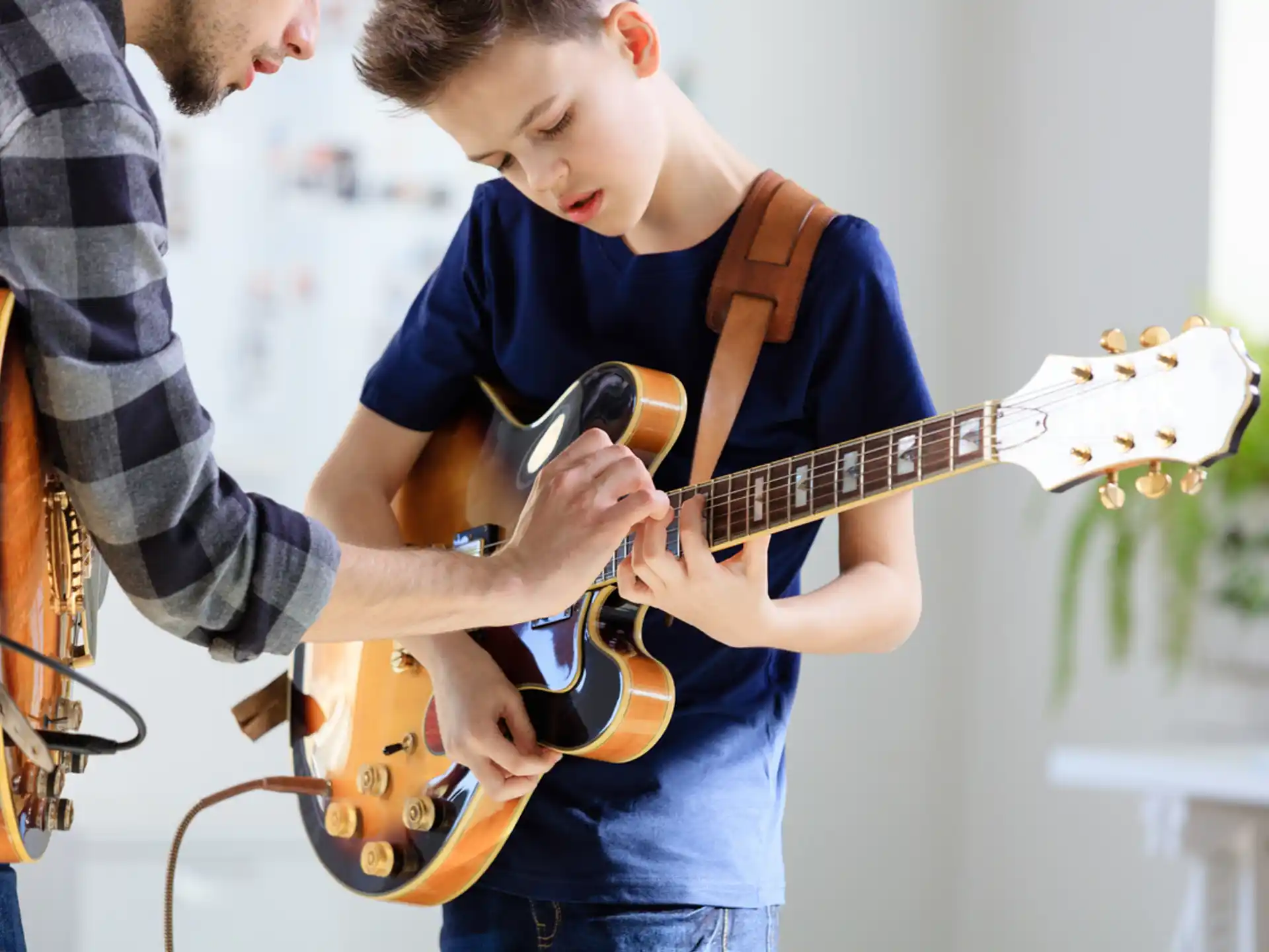 a person playing a guitar