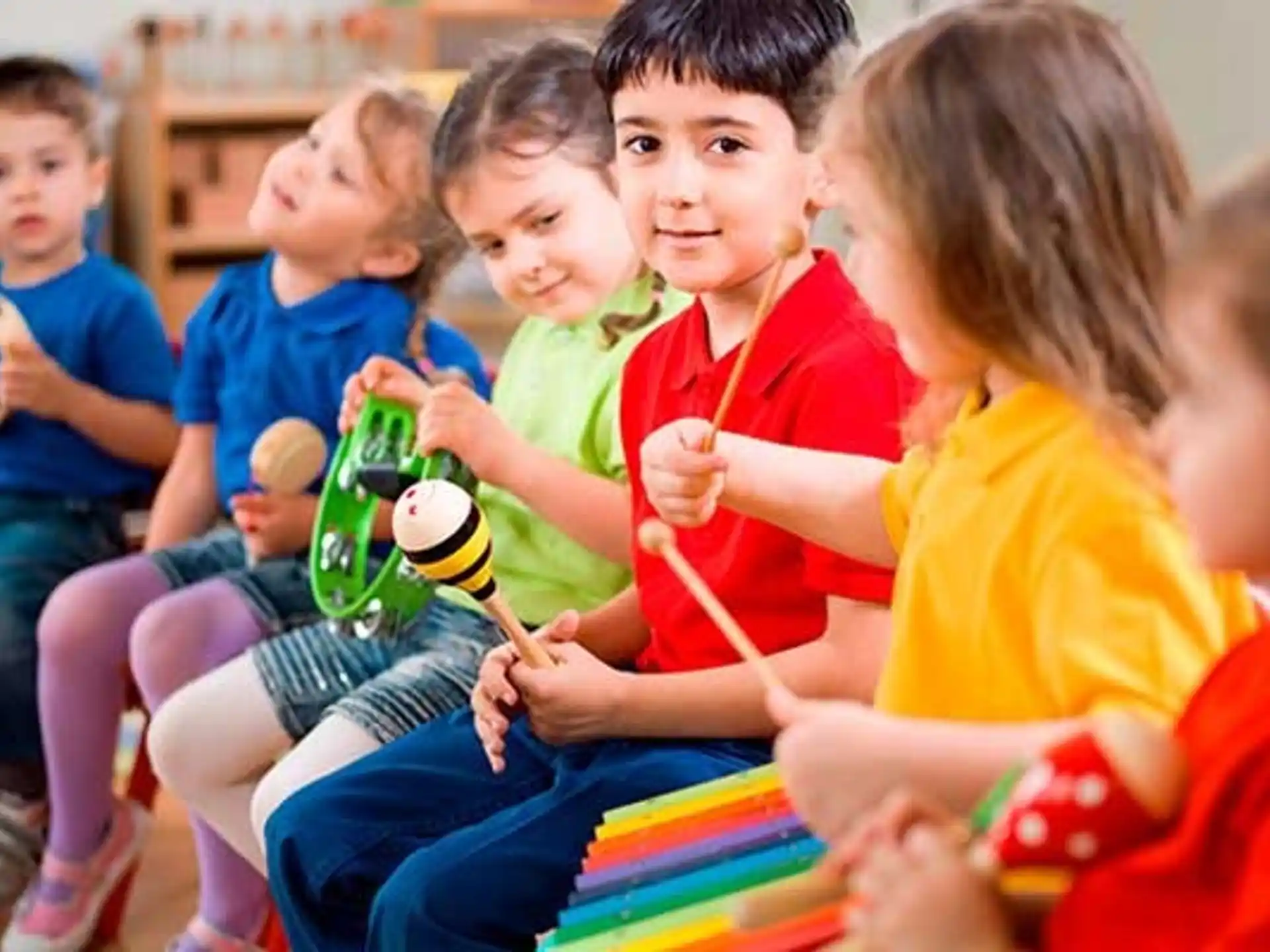 a group of children sitting on the floor