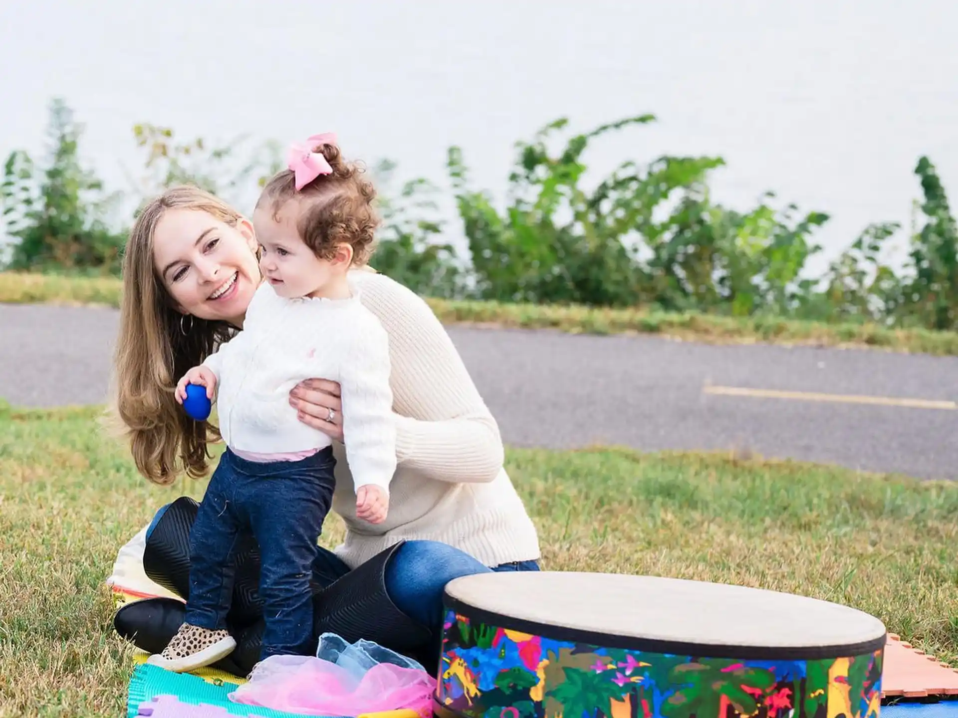 a person holding a child