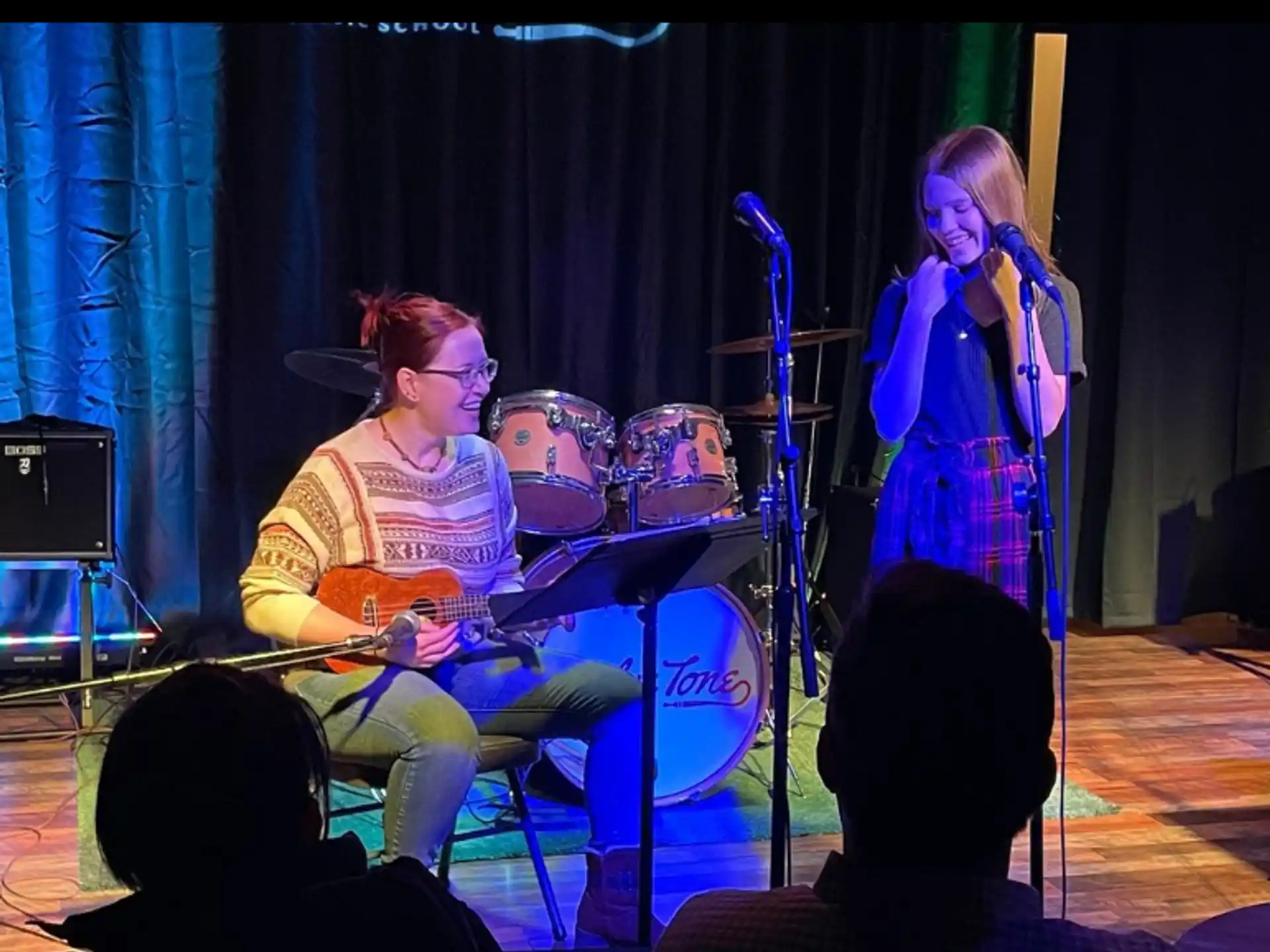 a group of women on a stage