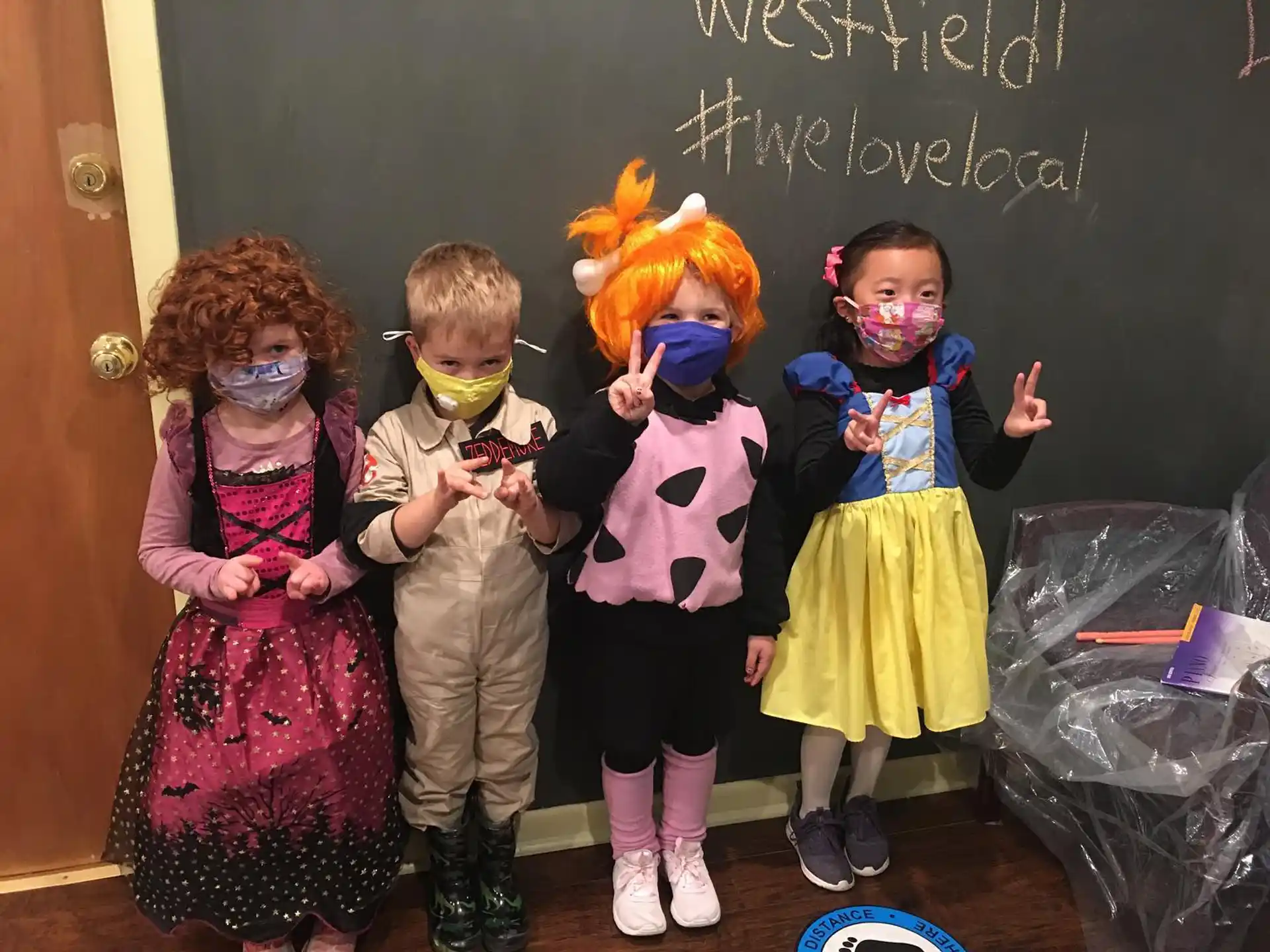 a group of children wearing clothing