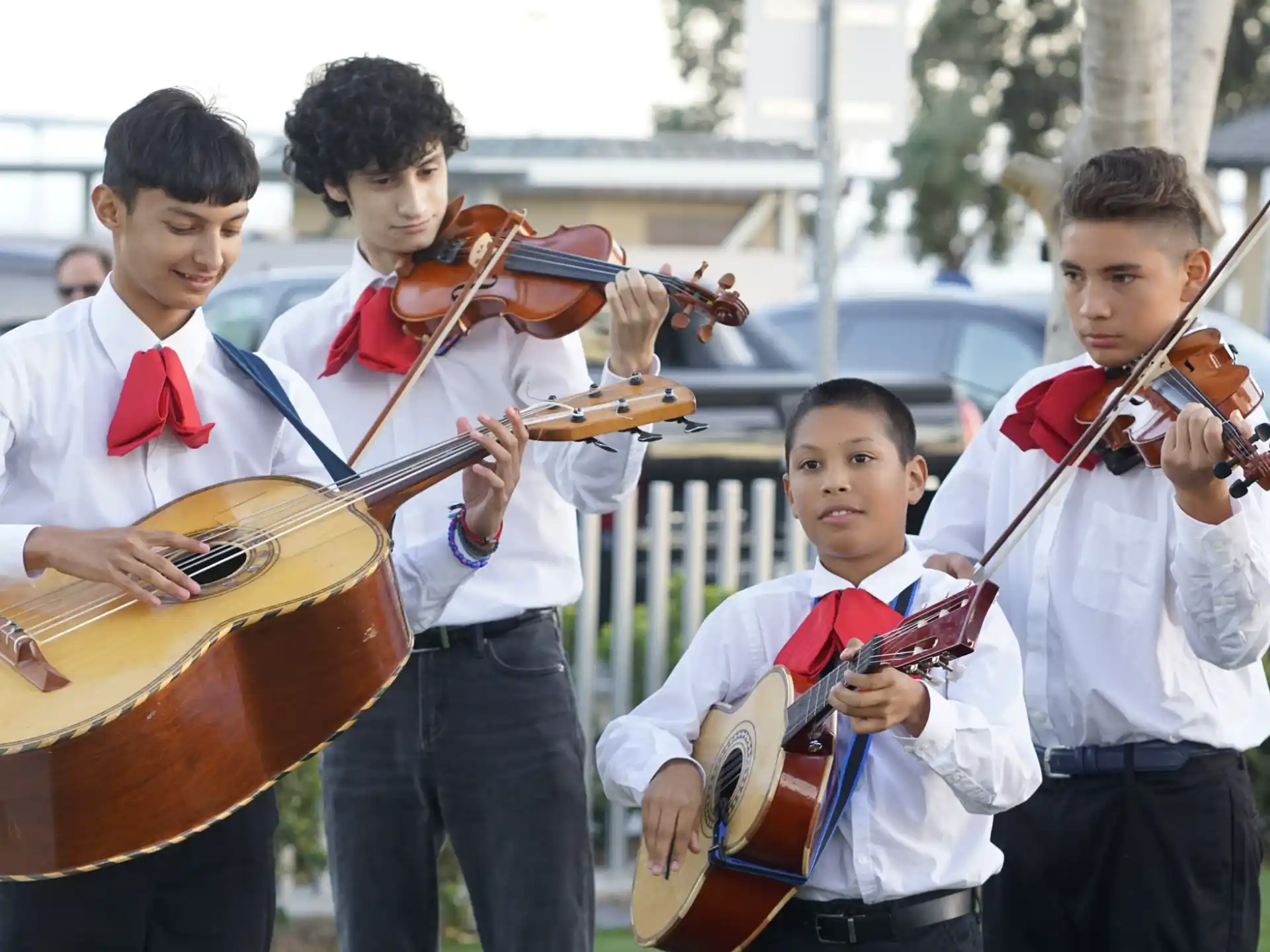 a group of boys playing instruments