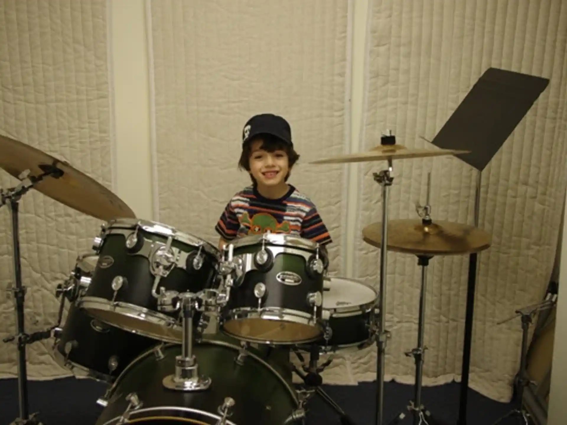 a boy playing the drums