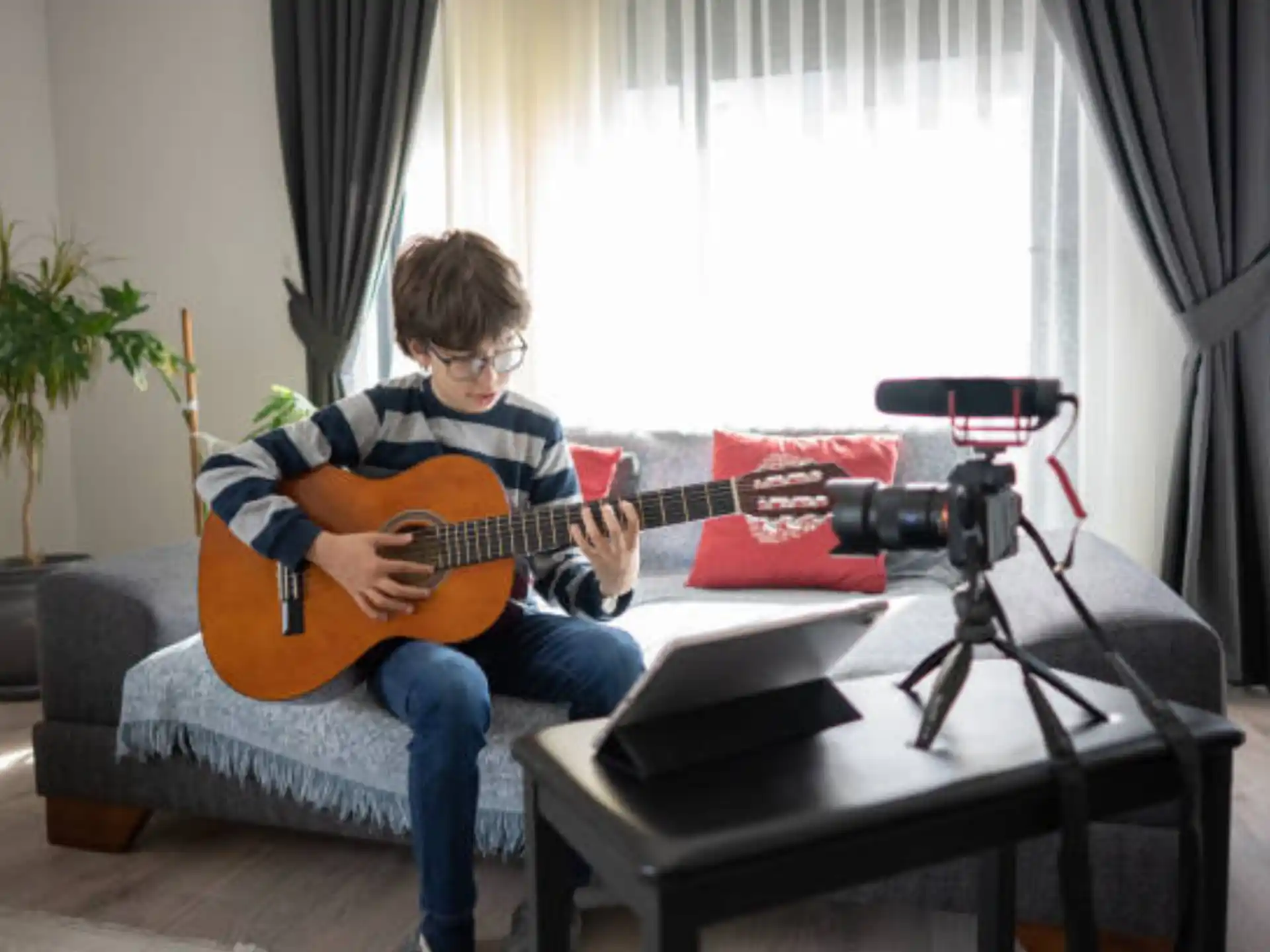 a person playing a guitar