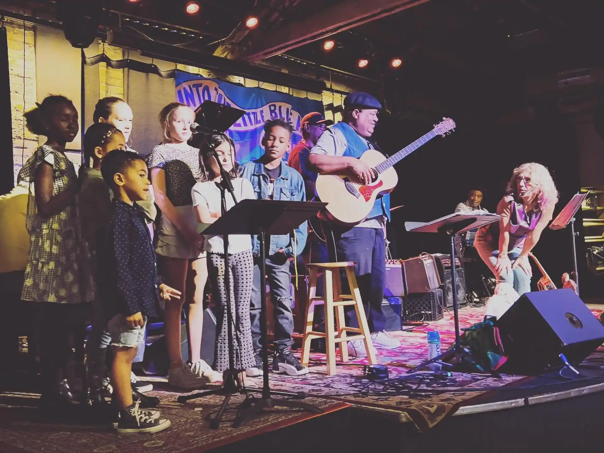 a group of people on a stage