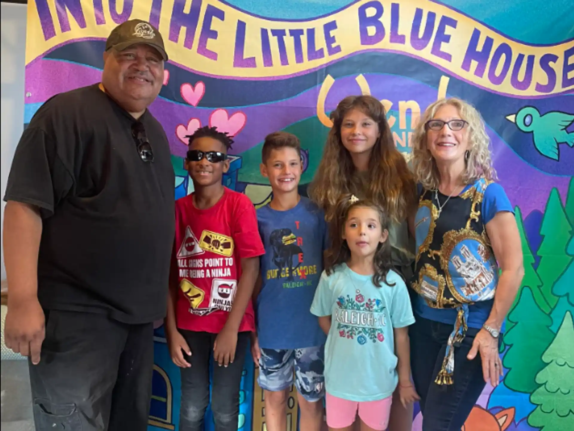a group of people posing for a photo