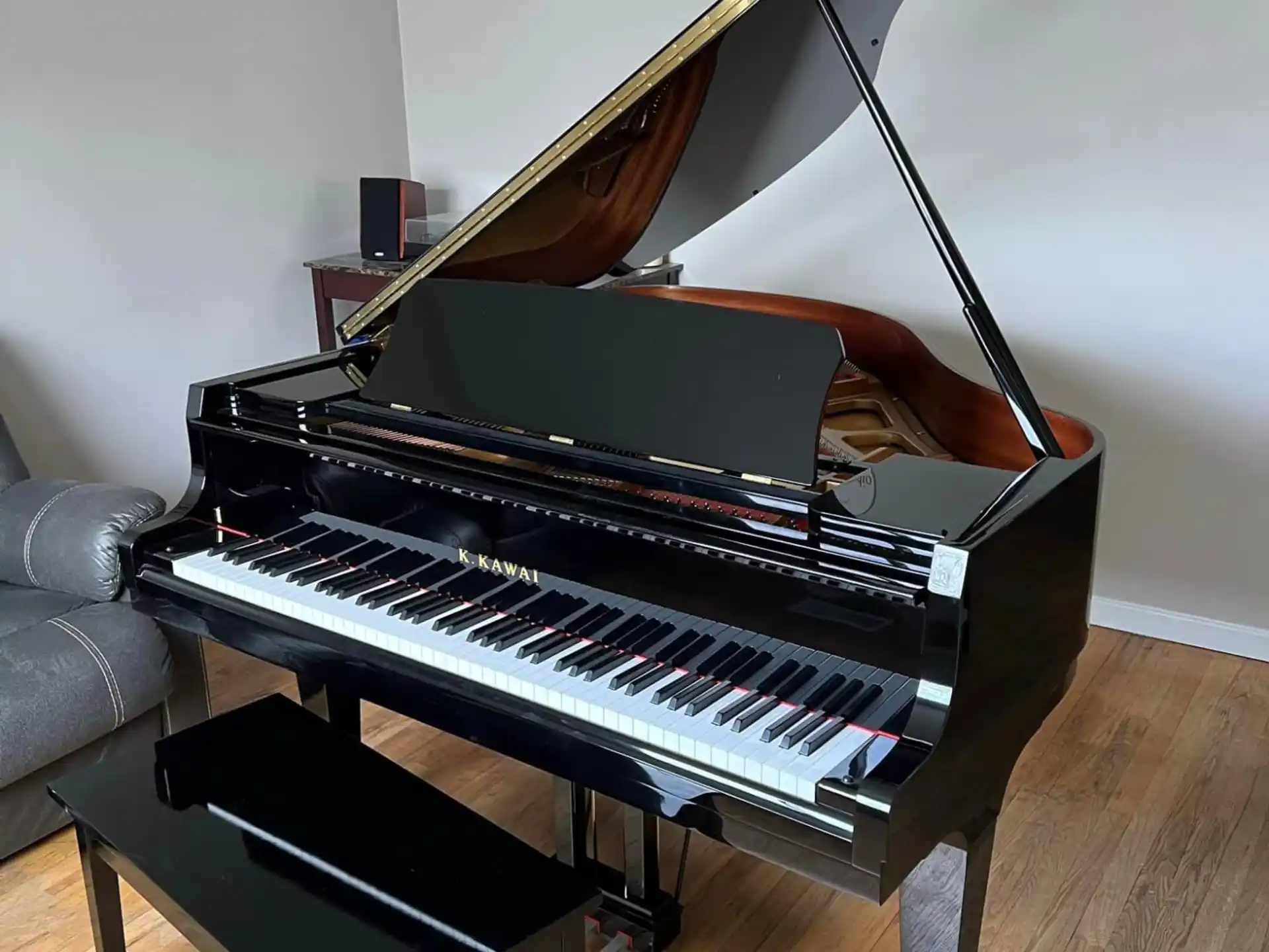 a piano with a lamp