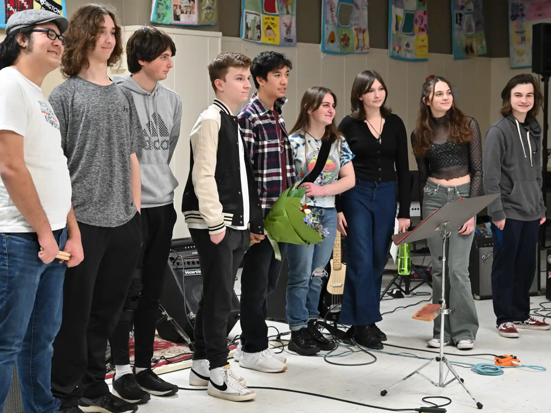 a group of people standing in a room