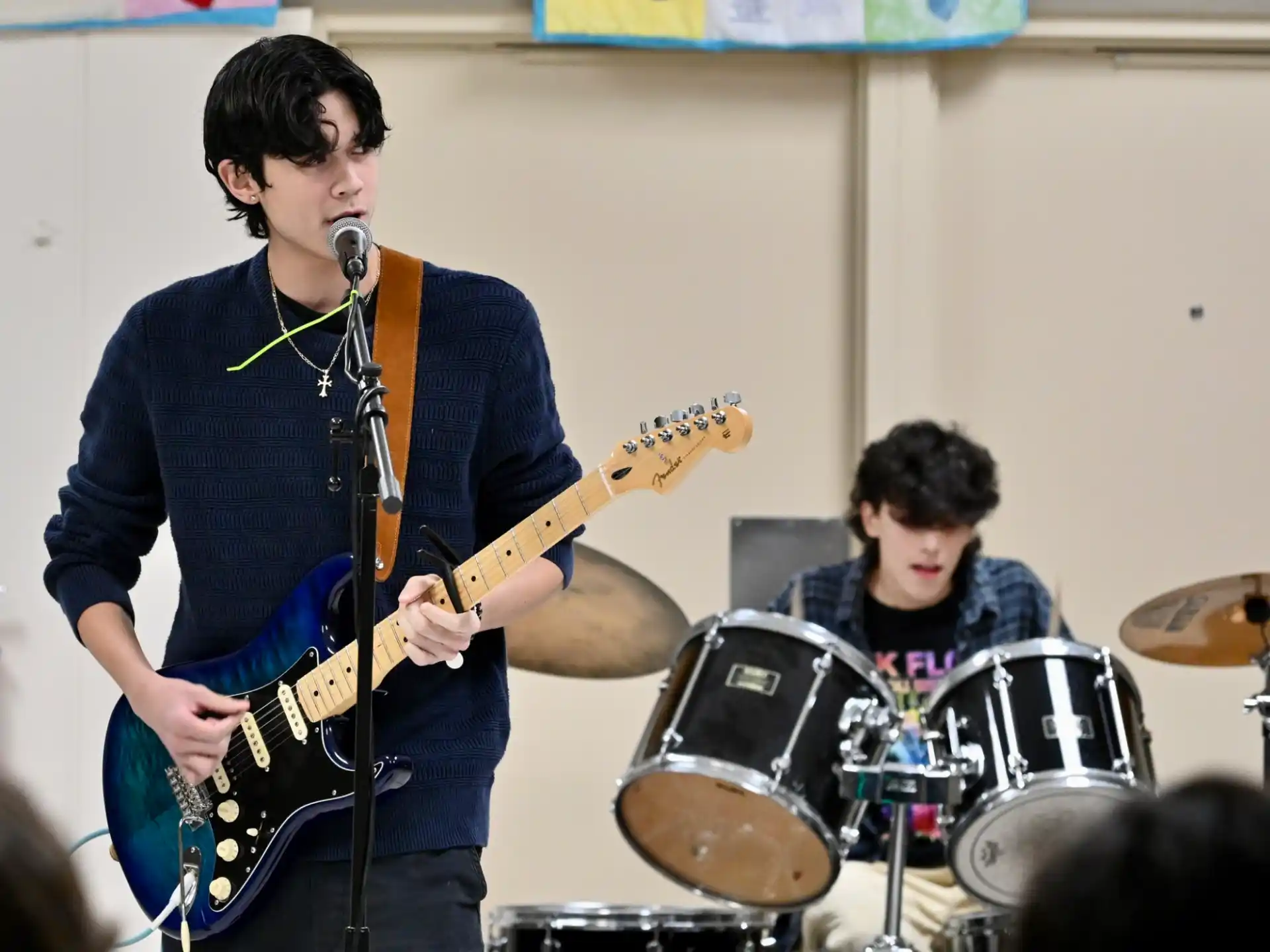 a man playing a guitar