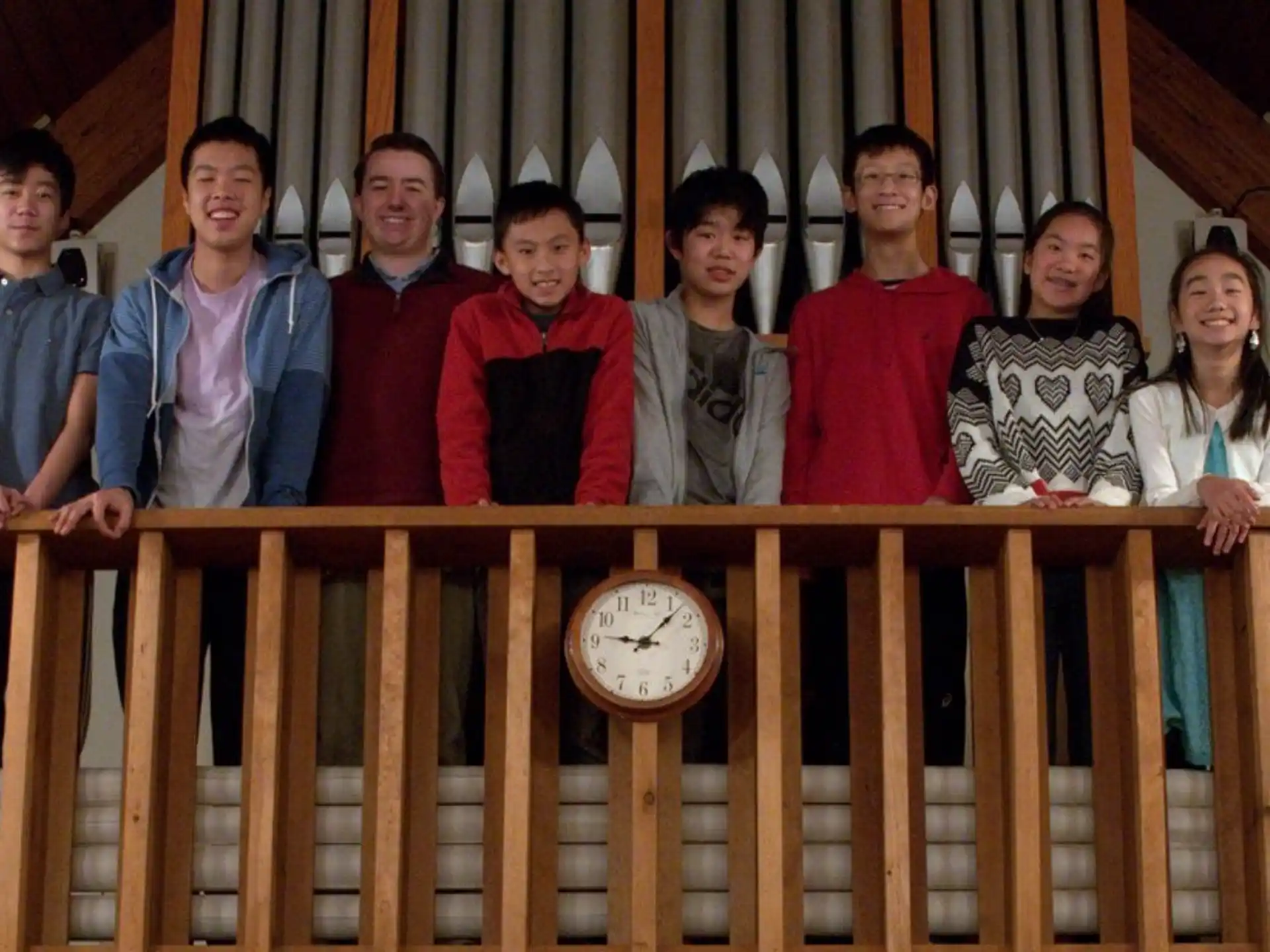 a group of people posing for a photo