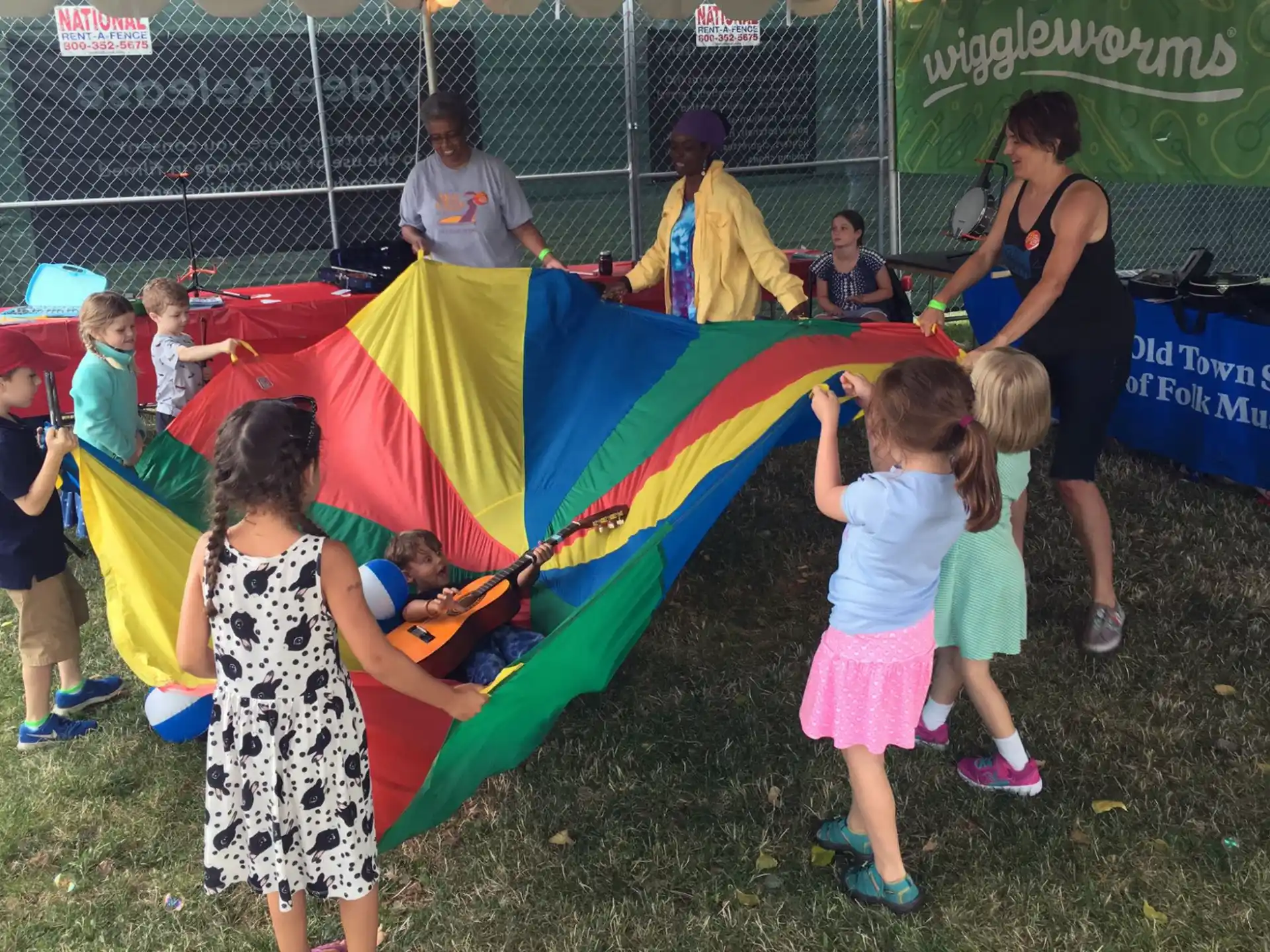 a group of children holding a flag