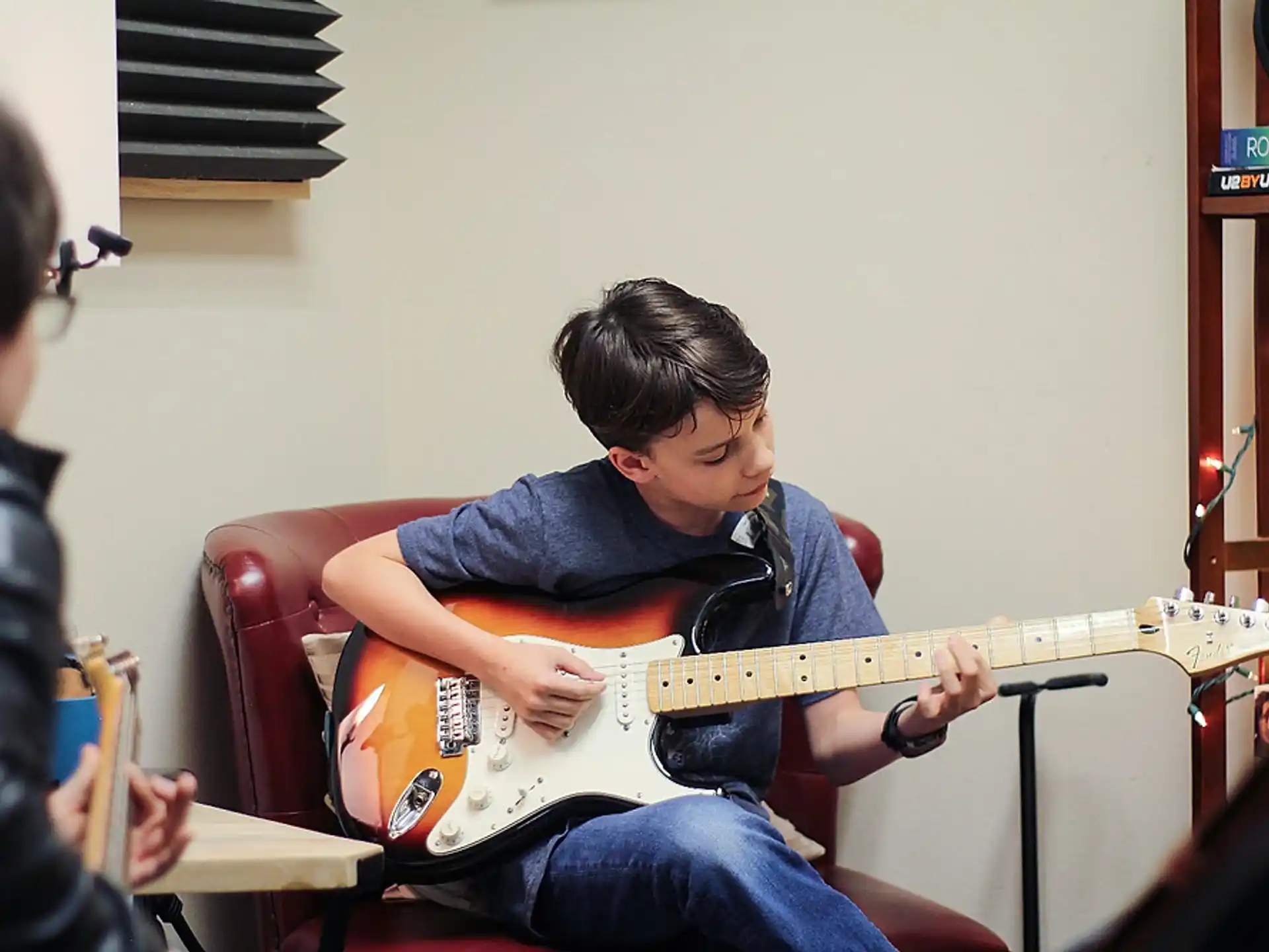a person playing a guitar