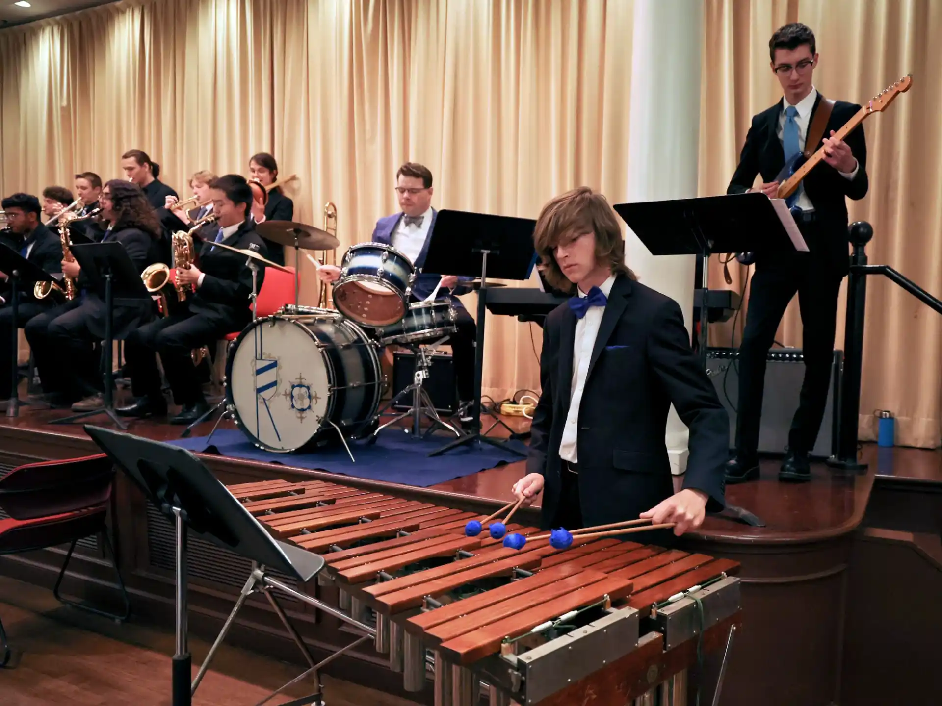 a group of people playing instruments