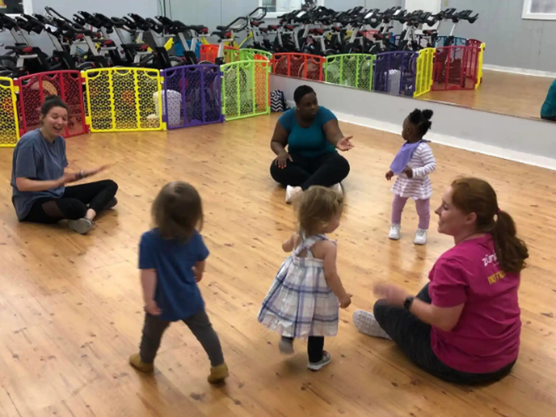 a group of people sitting on the floor