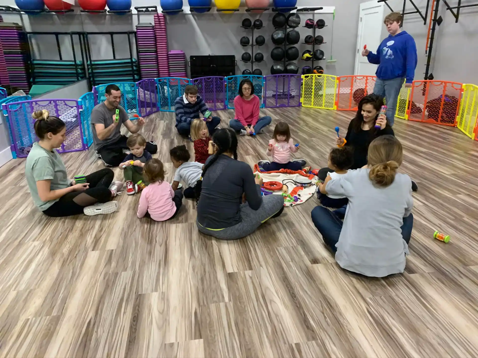 a group of people sitting on the floor