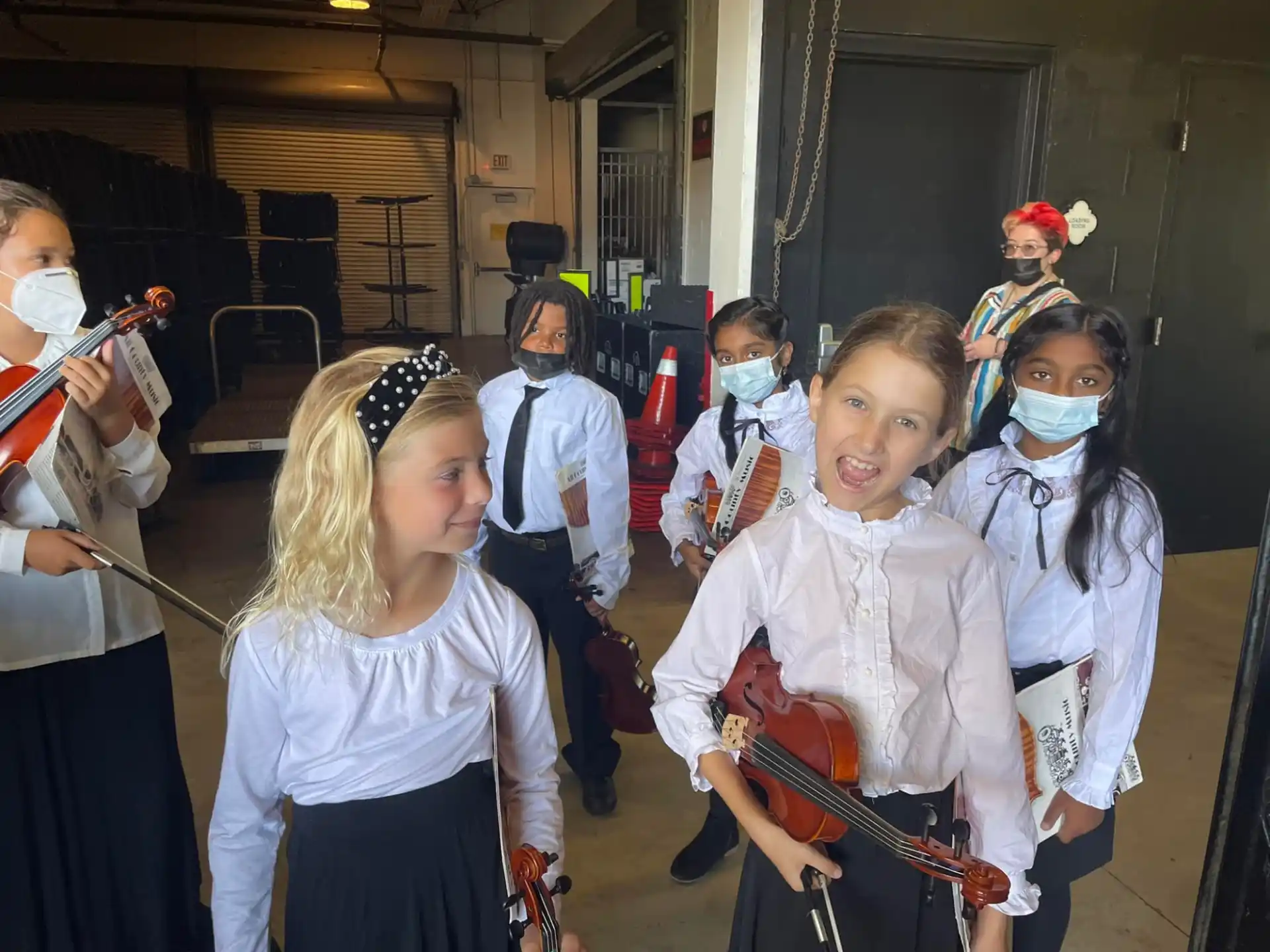 a group of children in clothing