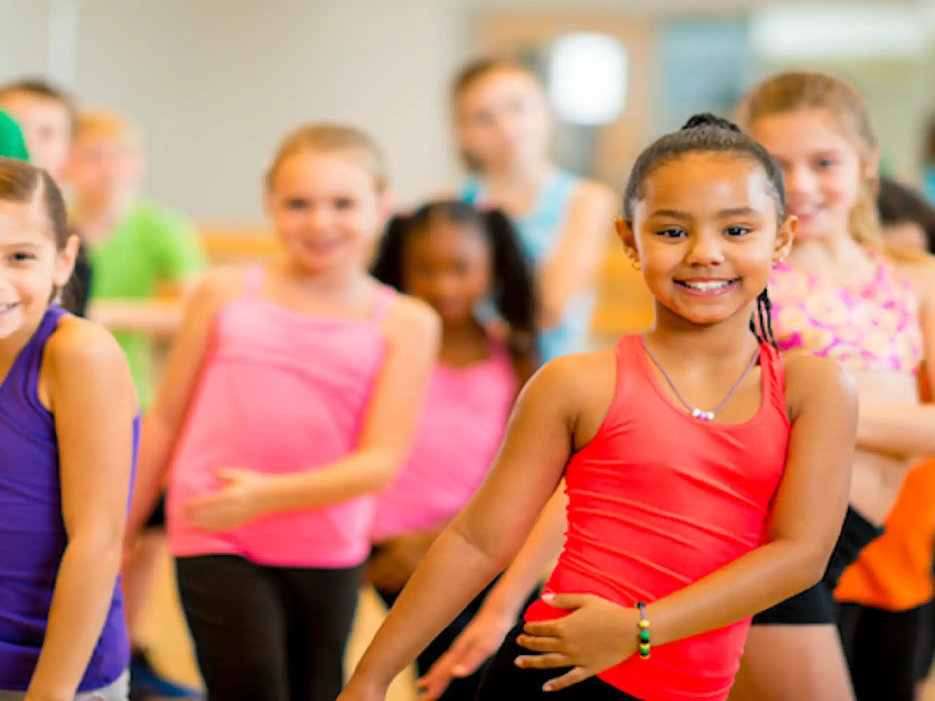 a group of girls in a gym