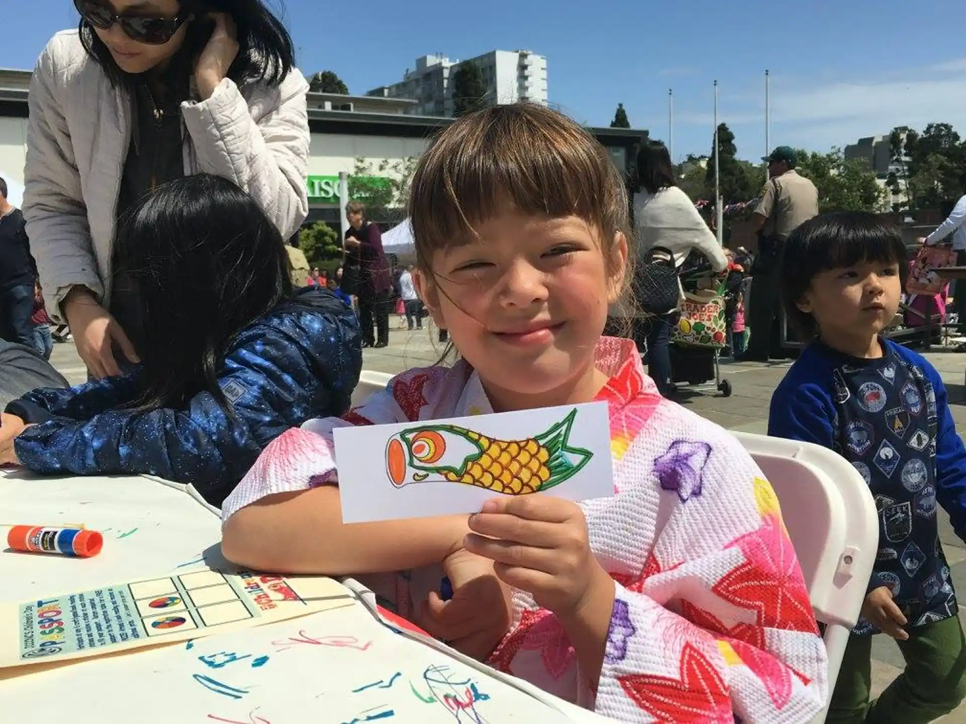 a child sitting at a table