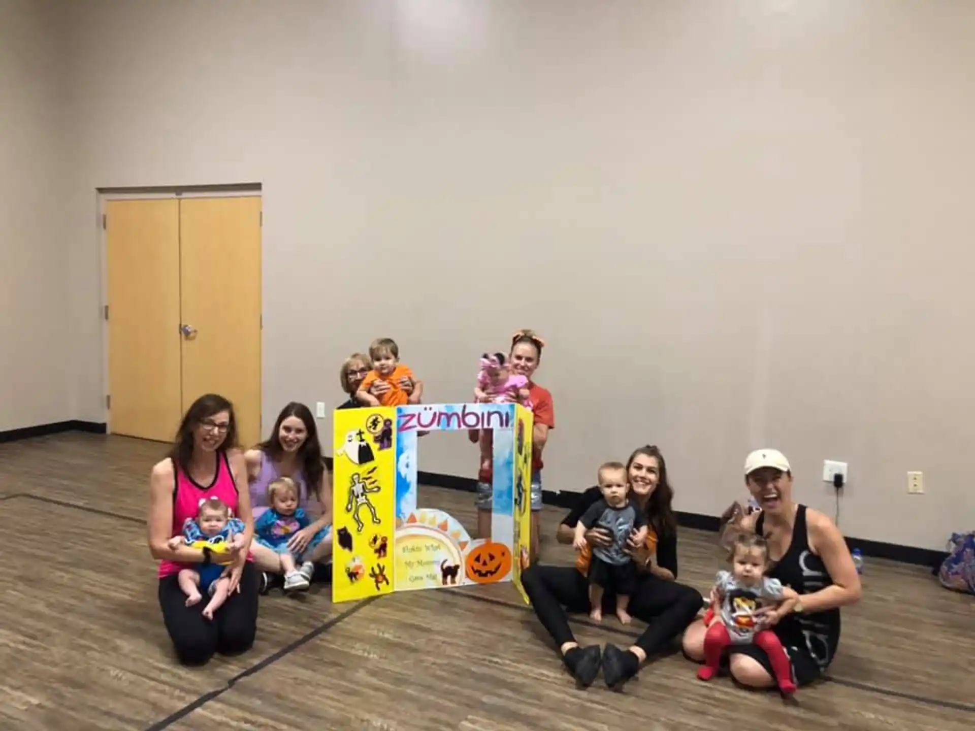 a group of people sitting on the floor