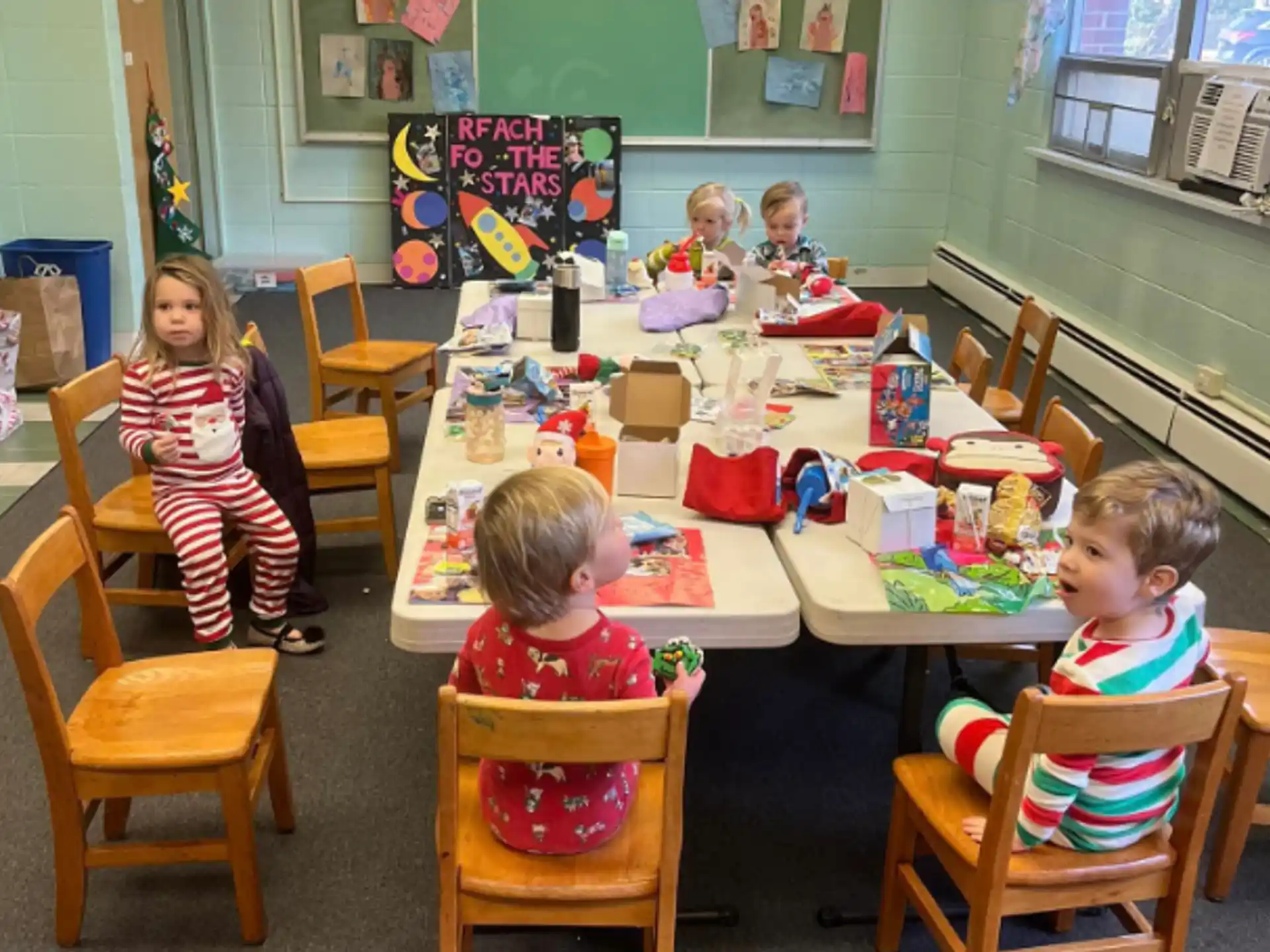 children sitting at a table